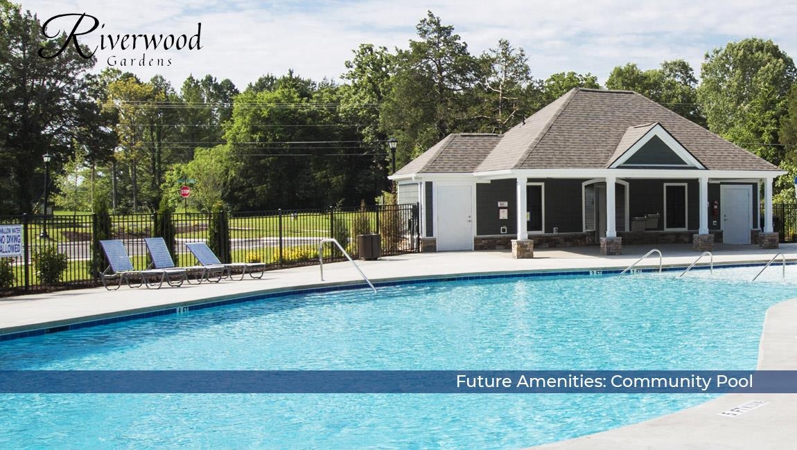 View of swimming pool with an outbuilding