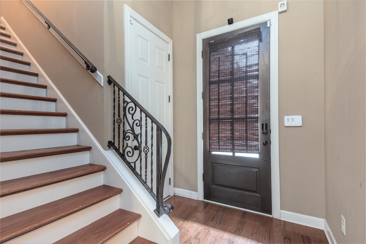 Entryway featuring hardwood / wood-style floors