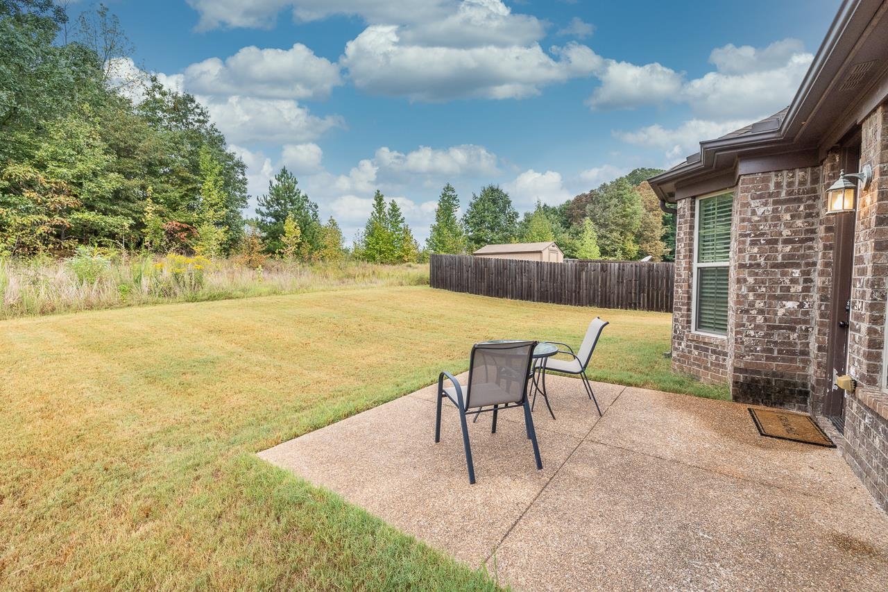 View of yard featuring a patio