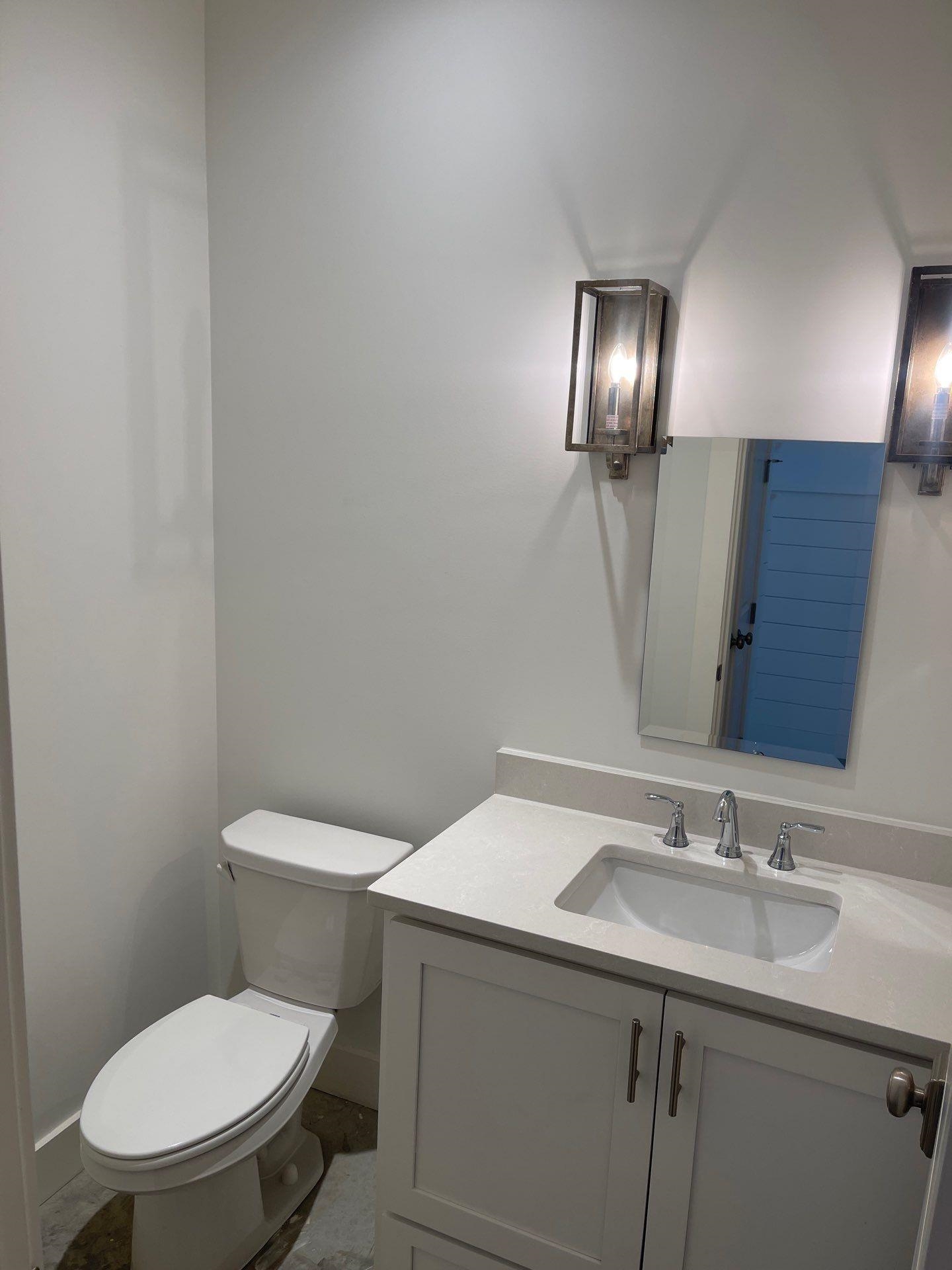 Bathroom with toilet and vanity