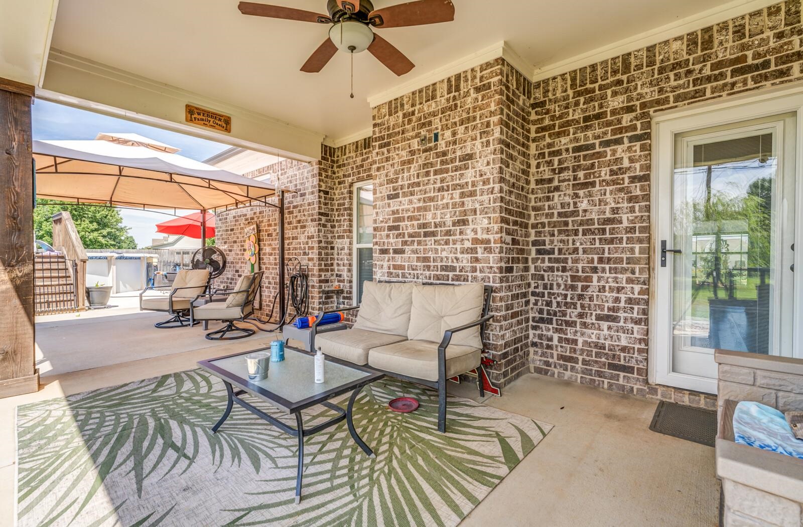 View of patio / terrace featuring ceiling fan