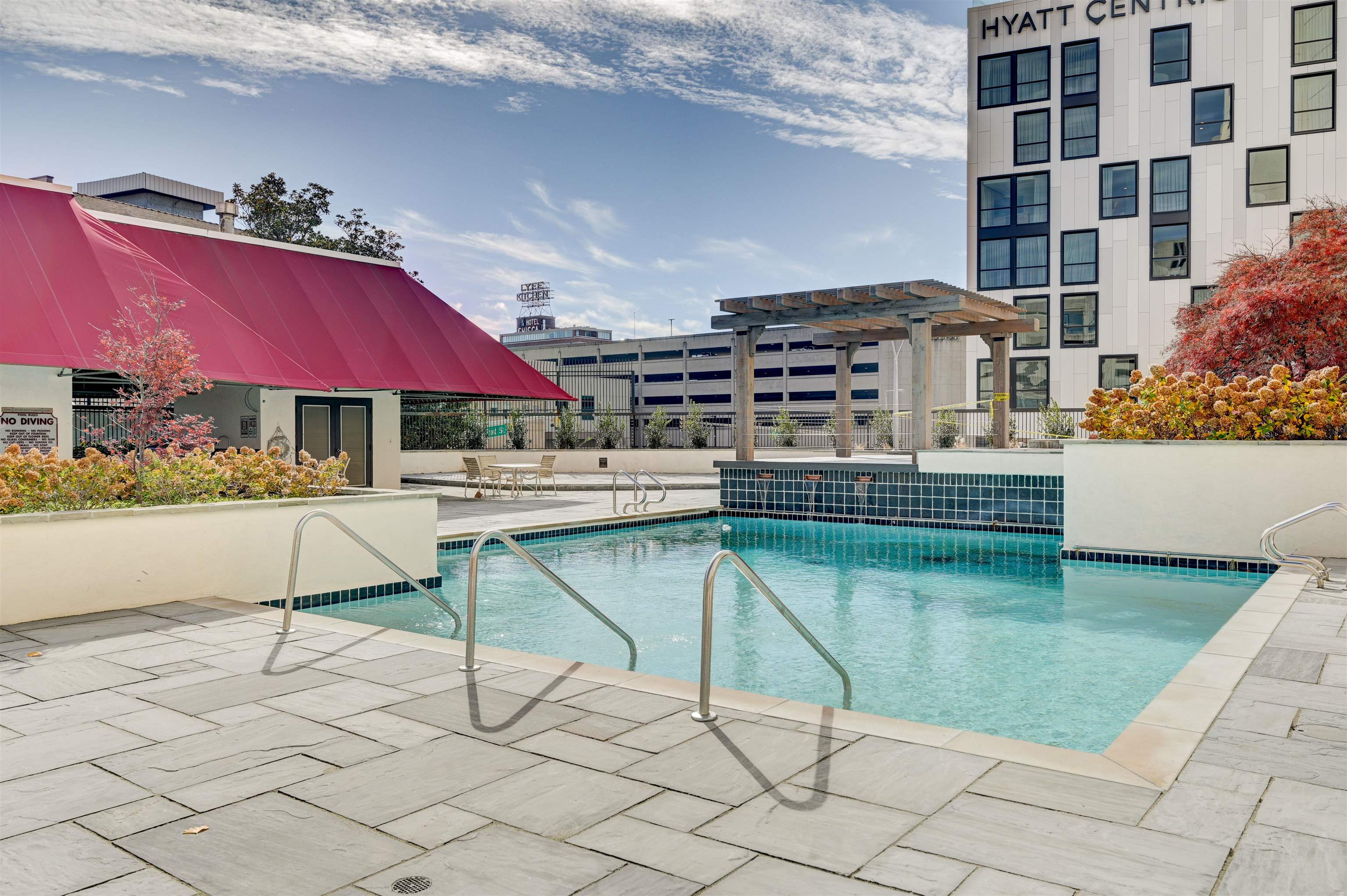 View of swimming pool featuring a pergola