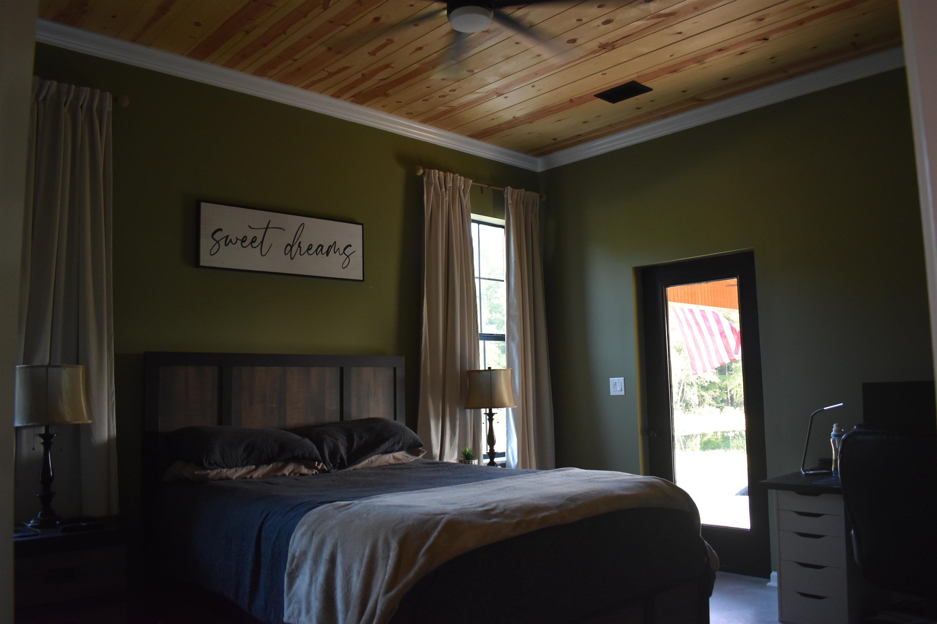 Bedroom with crown molding, access to exterior, ceiling fan, and wooden ceiling