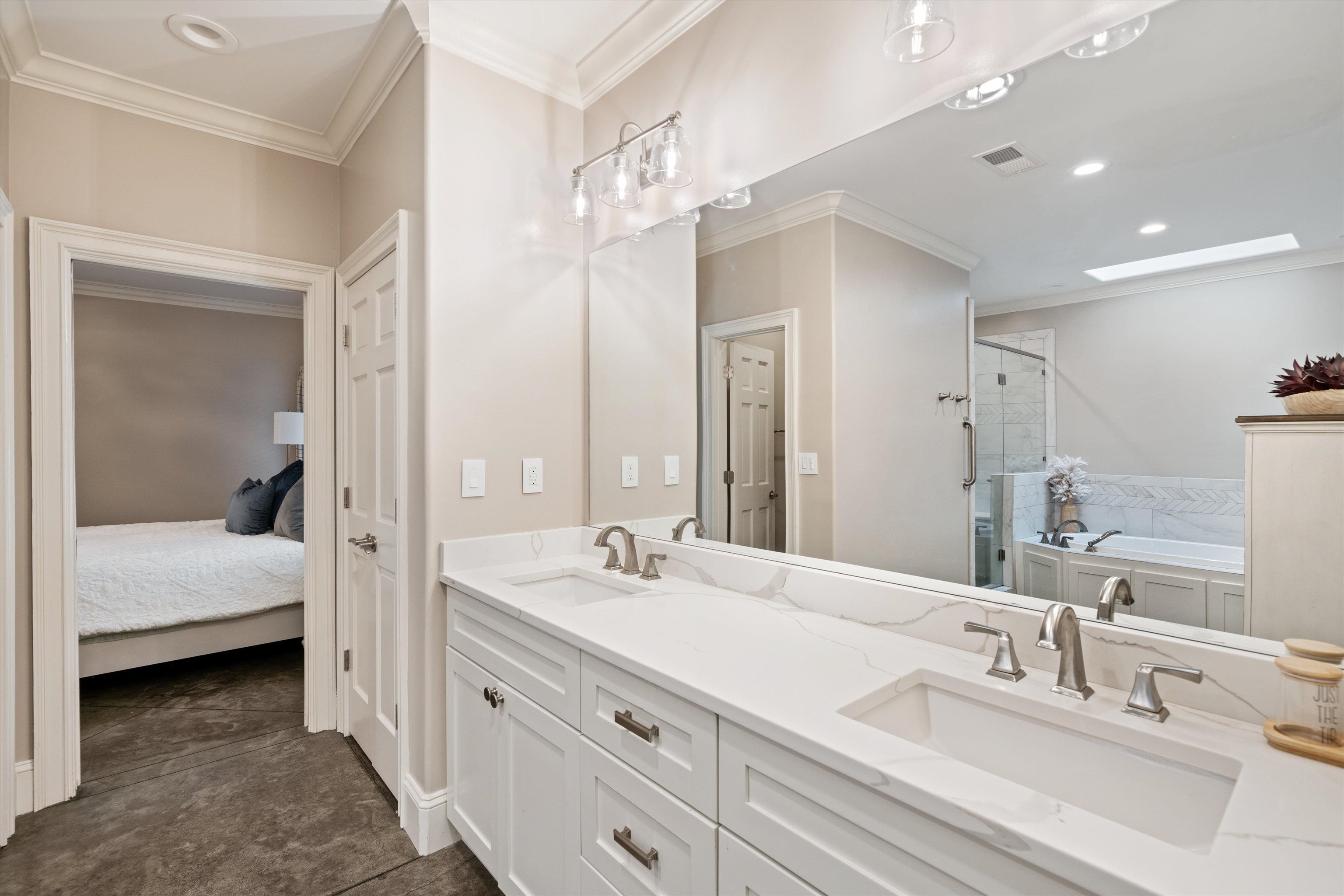 Bathroom with independent shower and bath, crown molding, and vanity