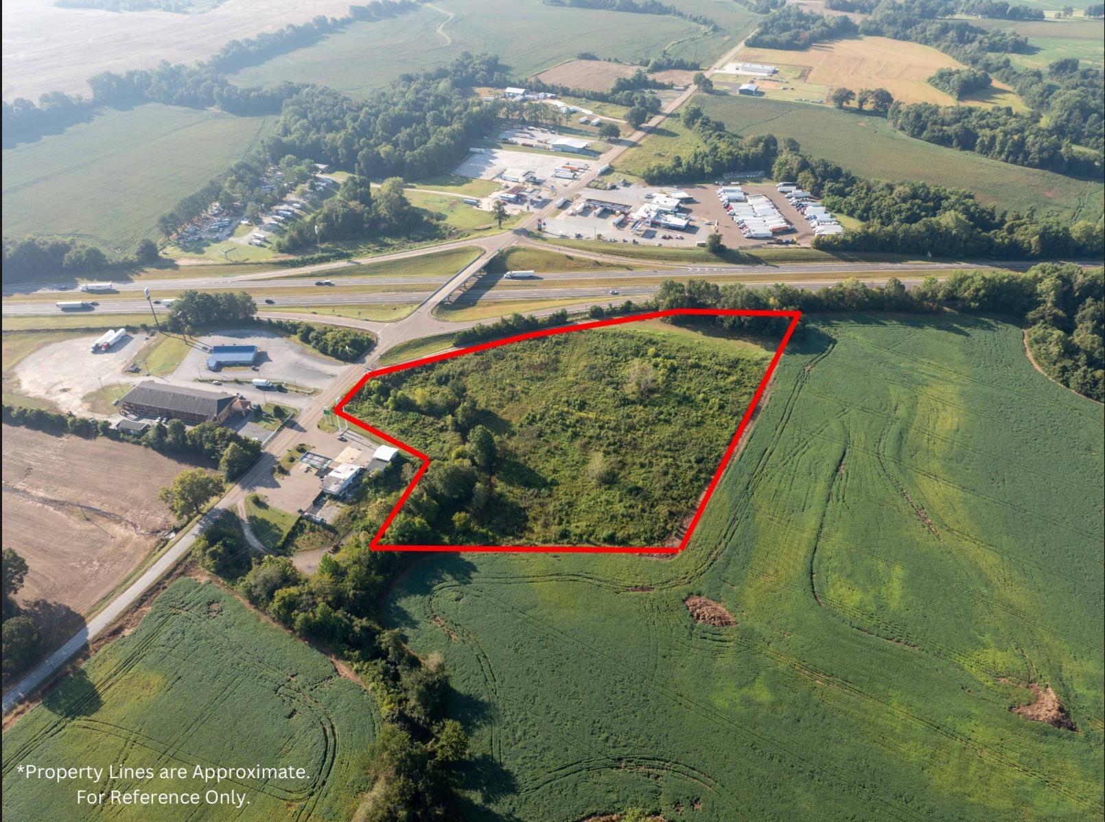 Birds eye view of property with a rural view