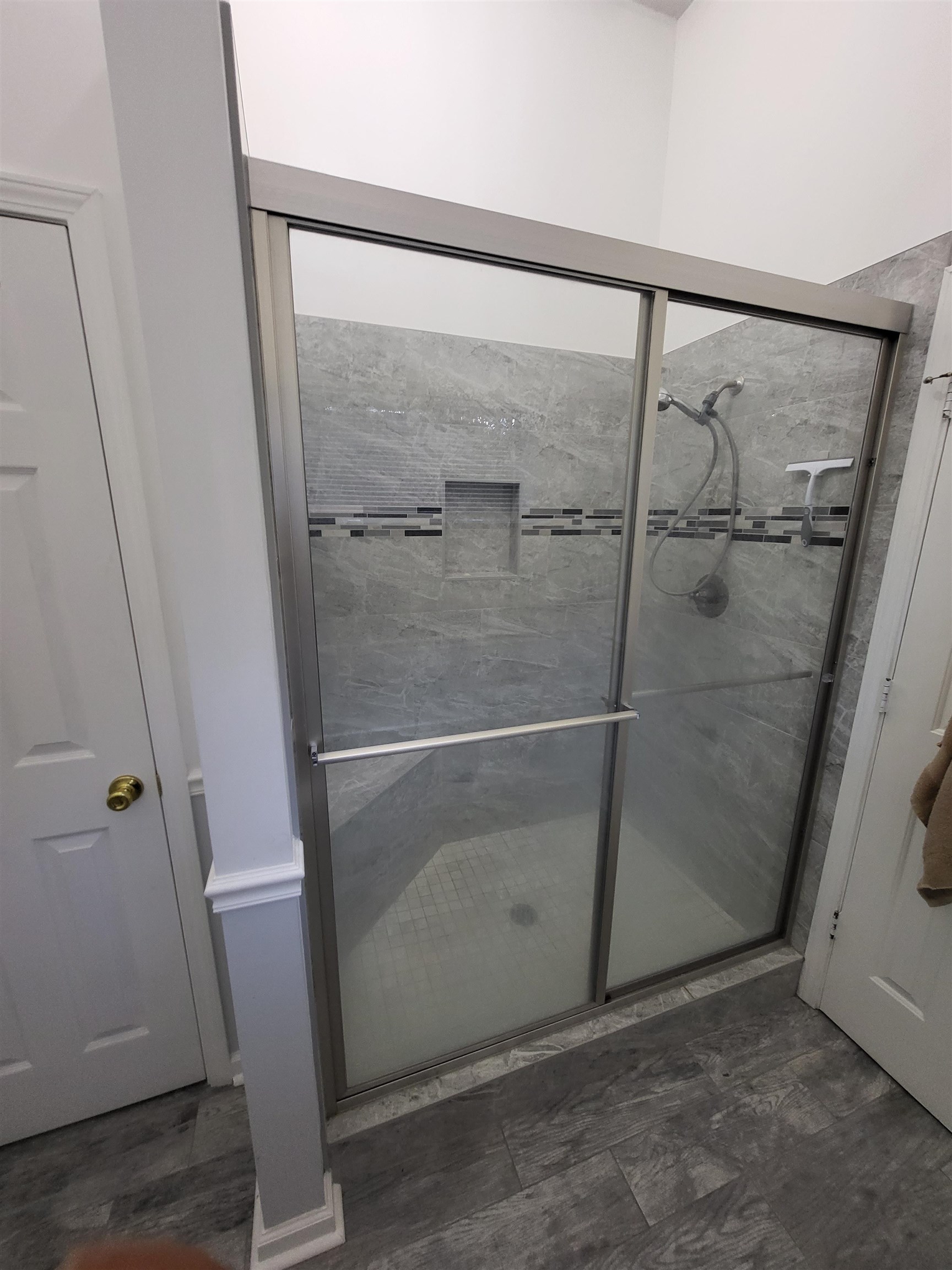 Bathroom featuring walk in shower