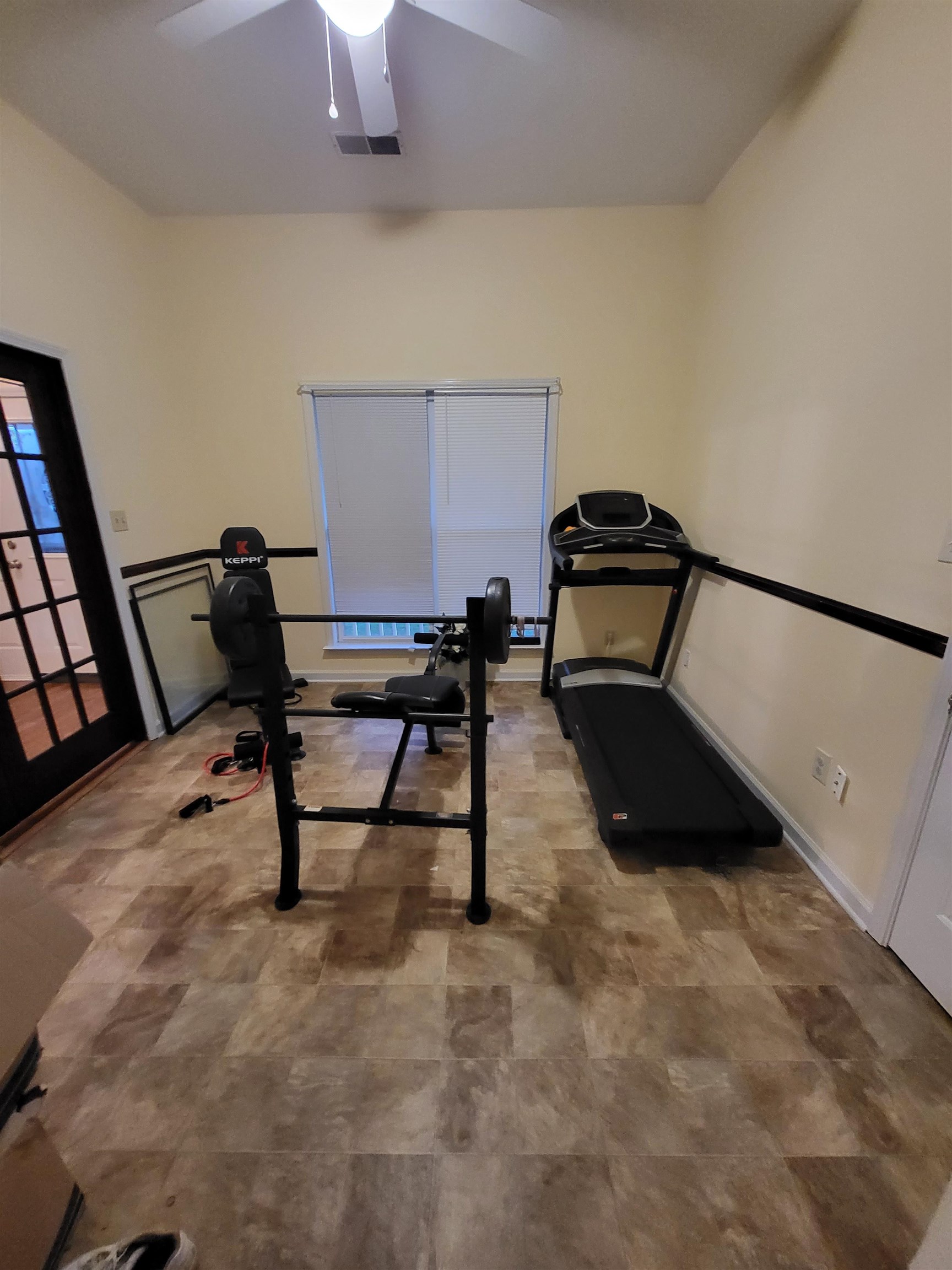 Workout room with ceiling fan