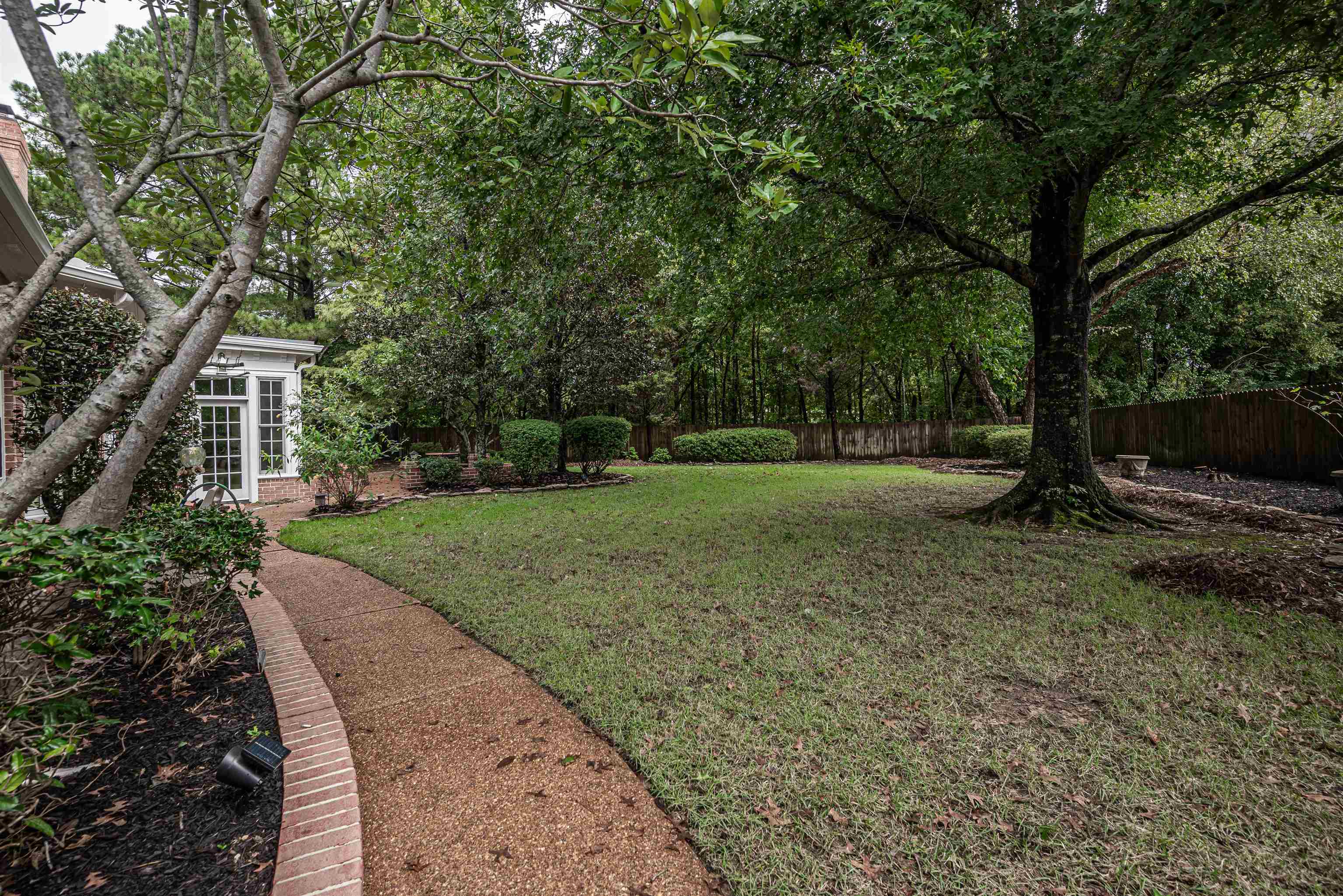 View of yard featuring french doors