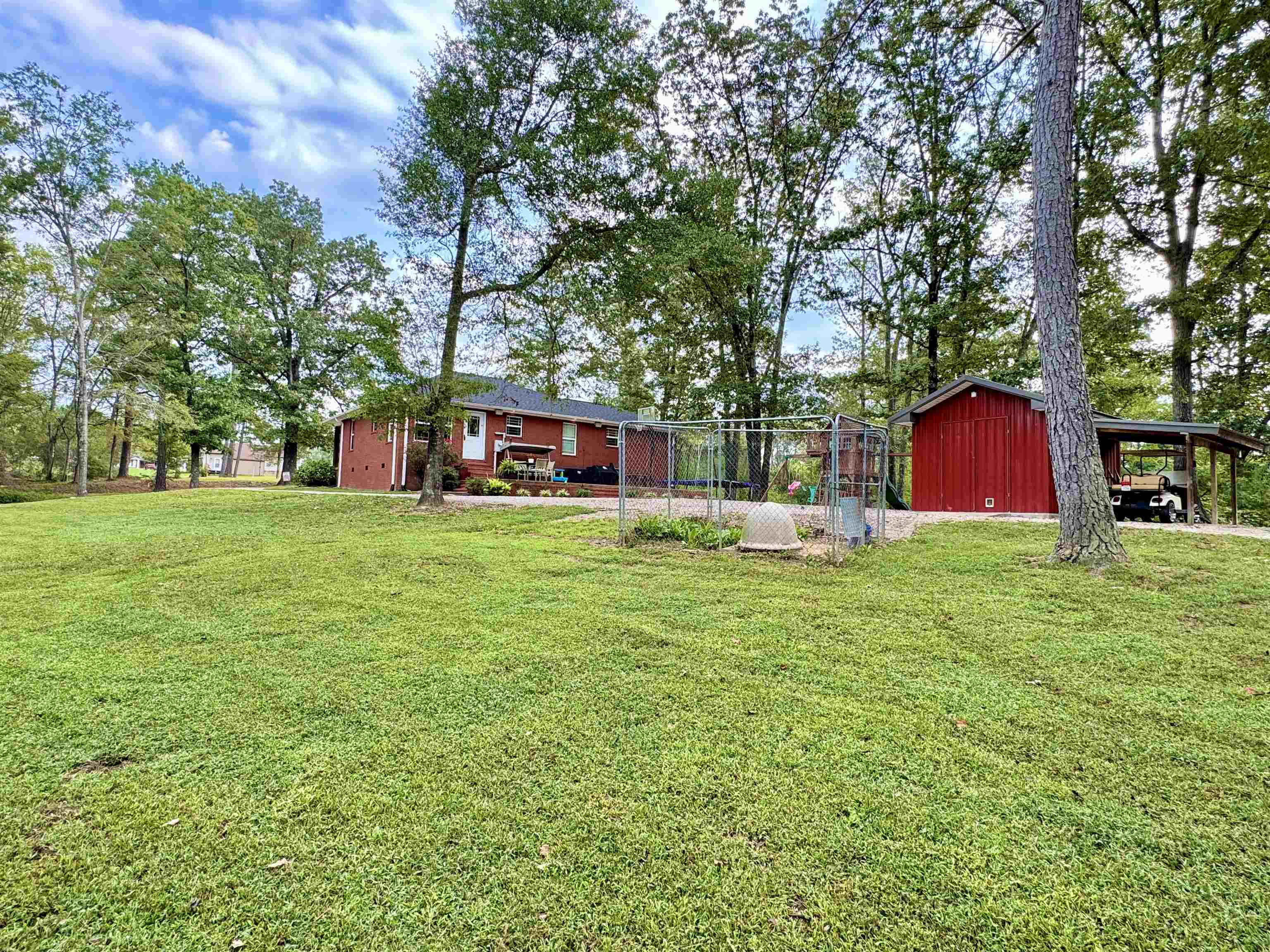 View of yard with an outbuilding
