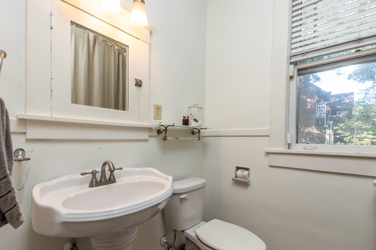 Bathroom featuring toilet and sink