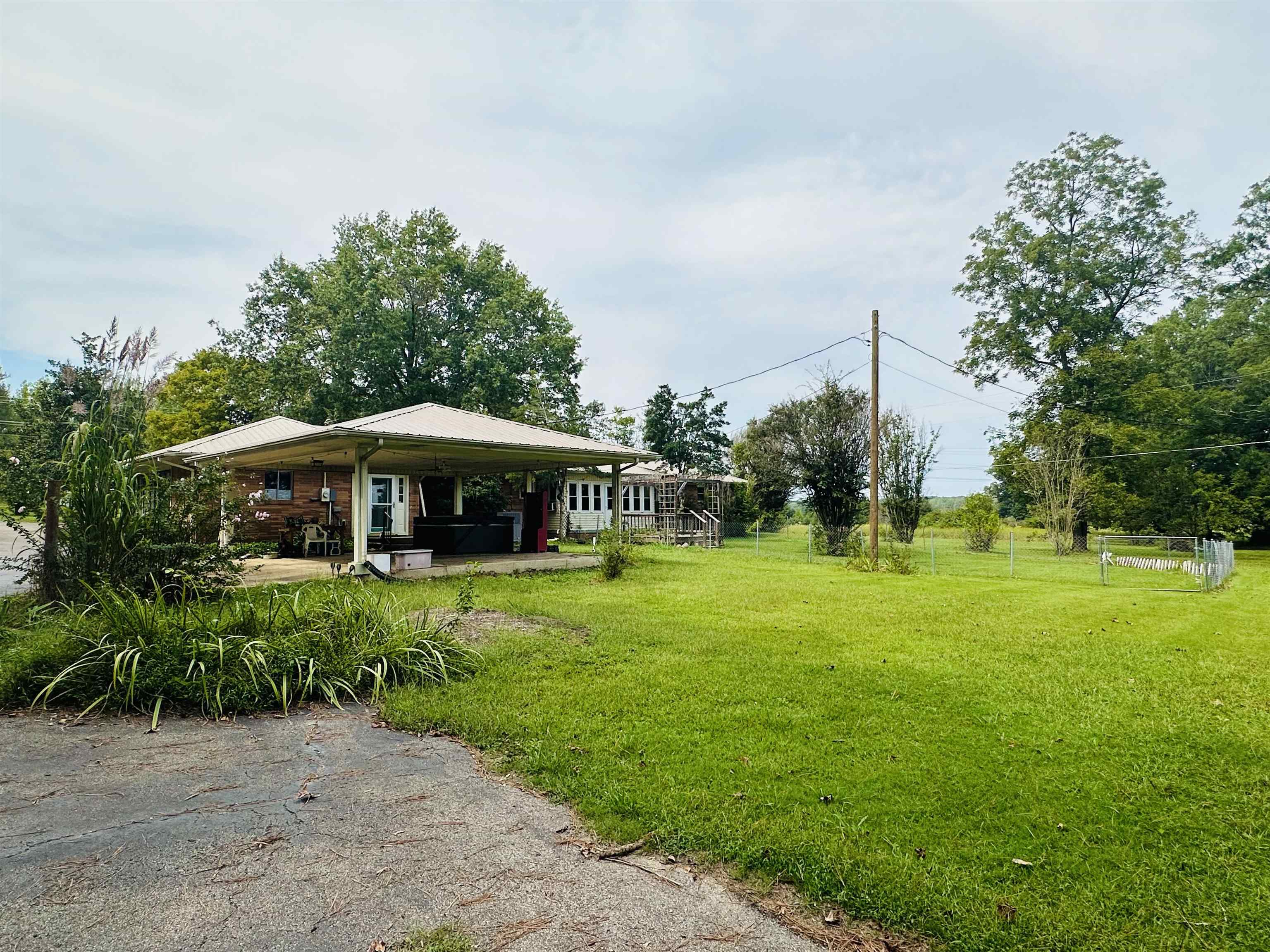 View of yard with a patio