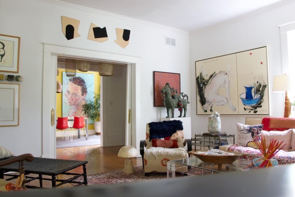 Living room featuring hardwood / wood-style flooring and crown molding