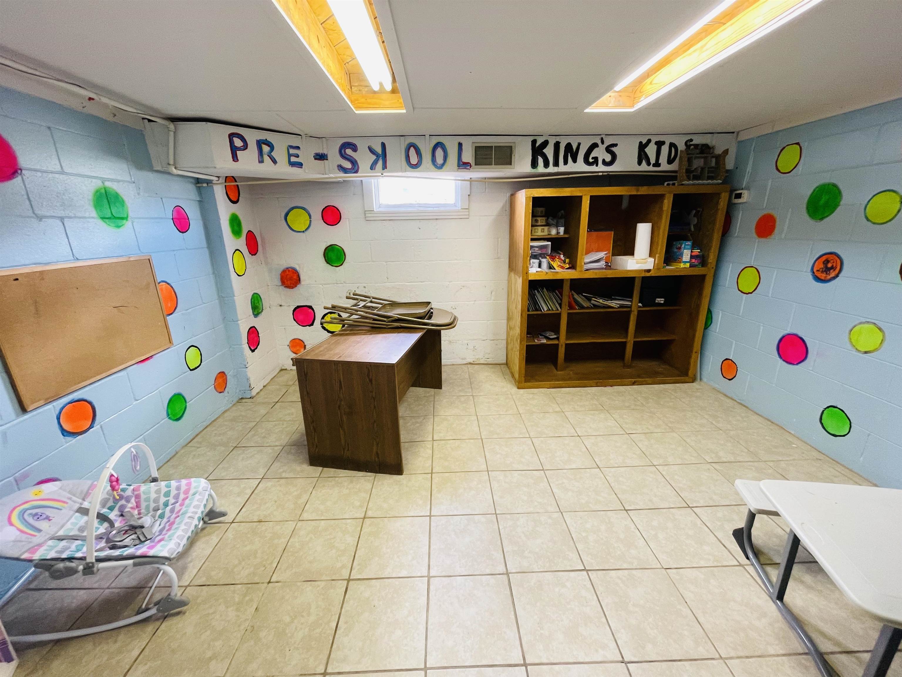 Playroom featuring light tile patterned flooring