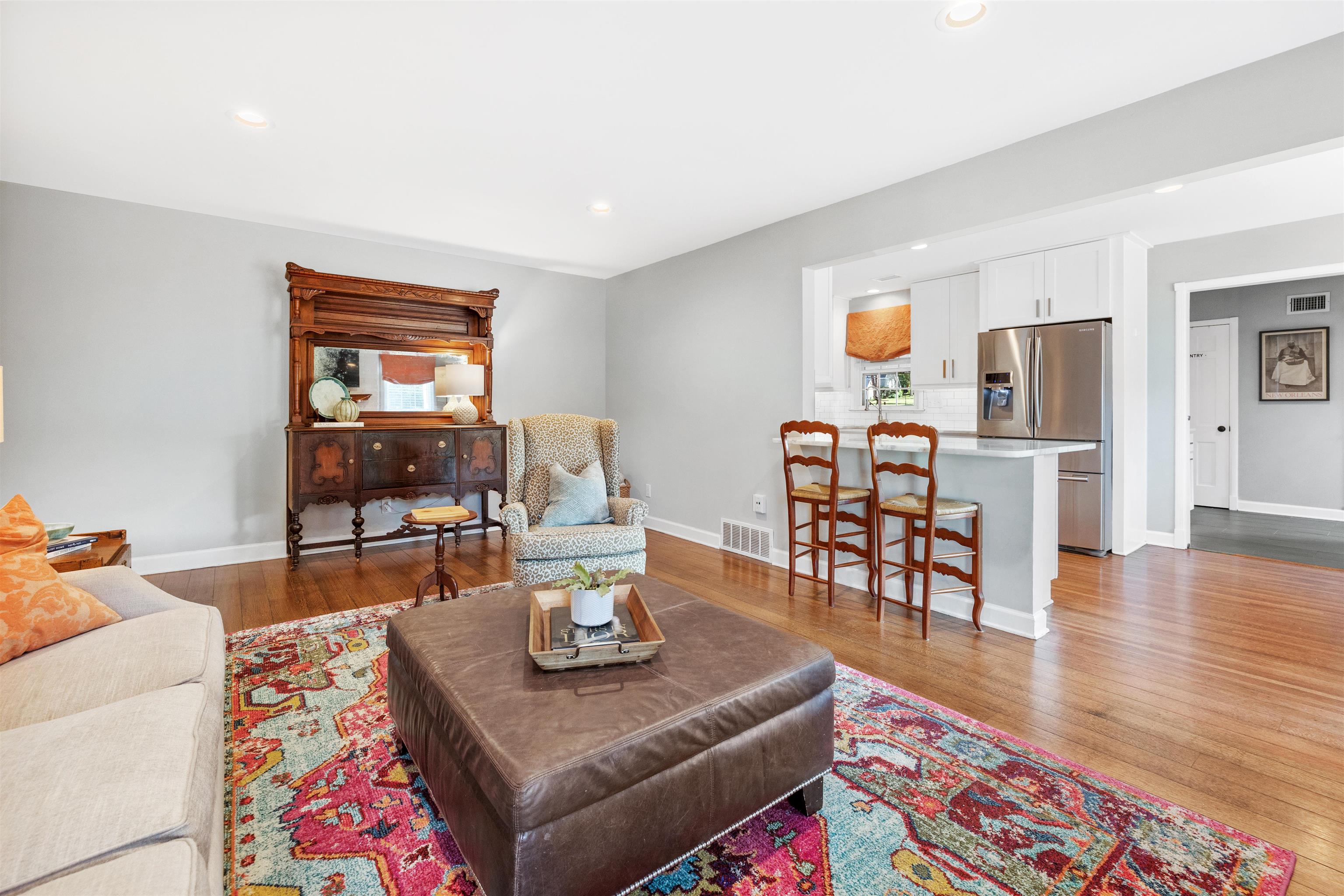 Living room featuring dark wood-type flooring