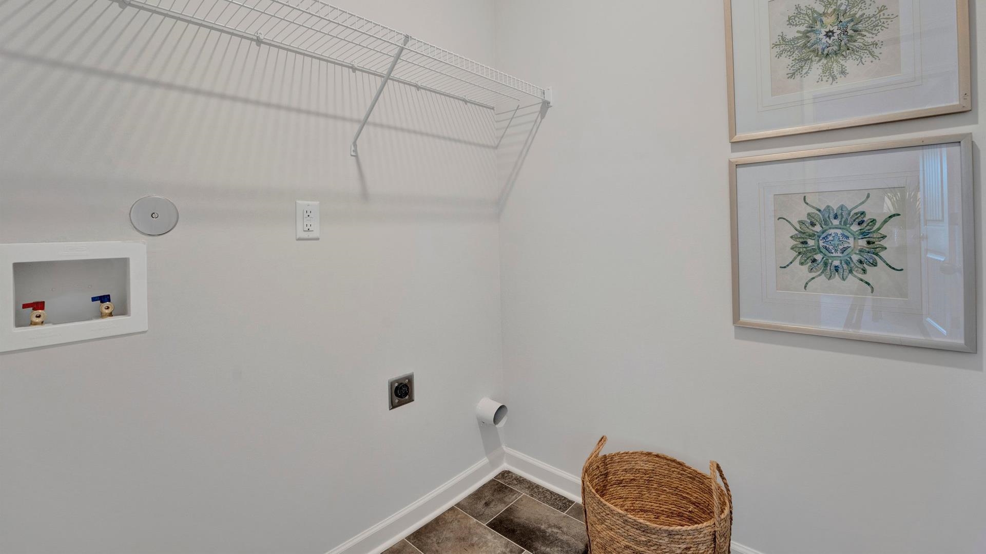 Laundry area featuring hookup for a washing machine and electric dryer hookup