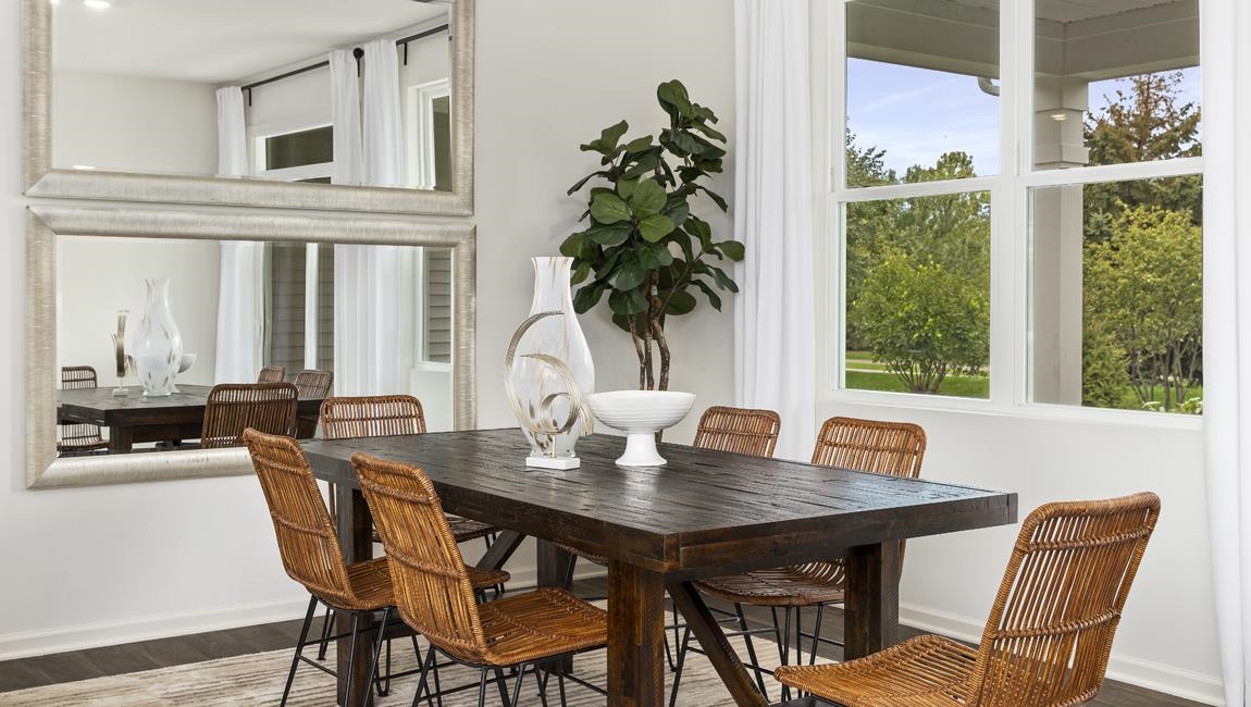 Dining room featuring dark wood-type flooring