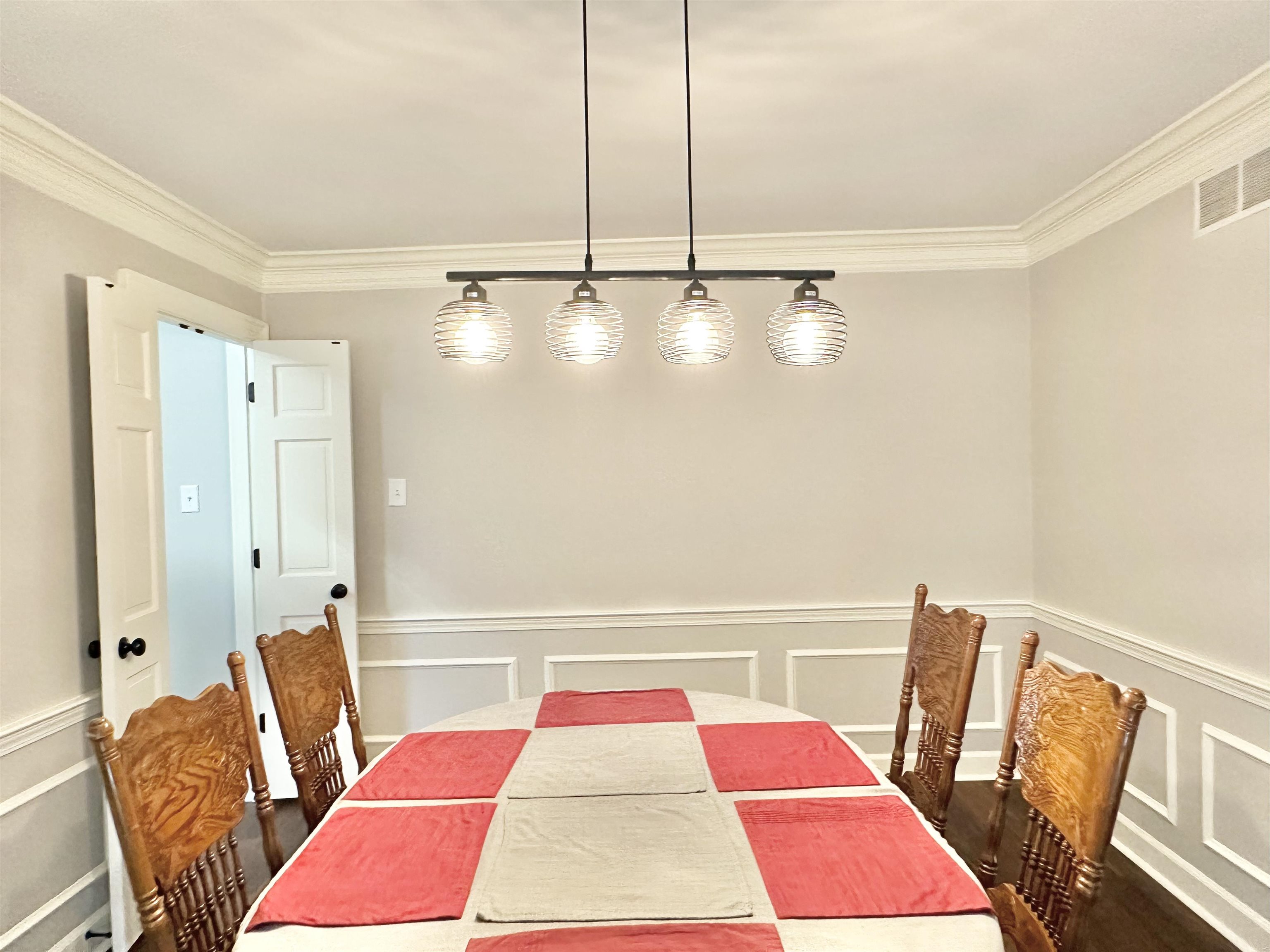 Dining room featuring ornamental molding