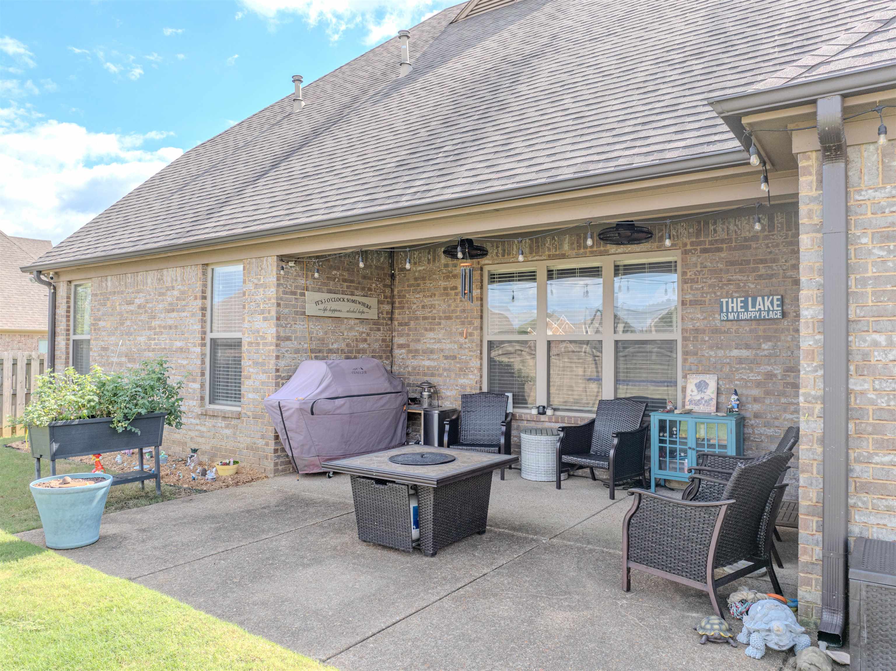 View of patio / terrace with grilling area and an outdoor fire pit