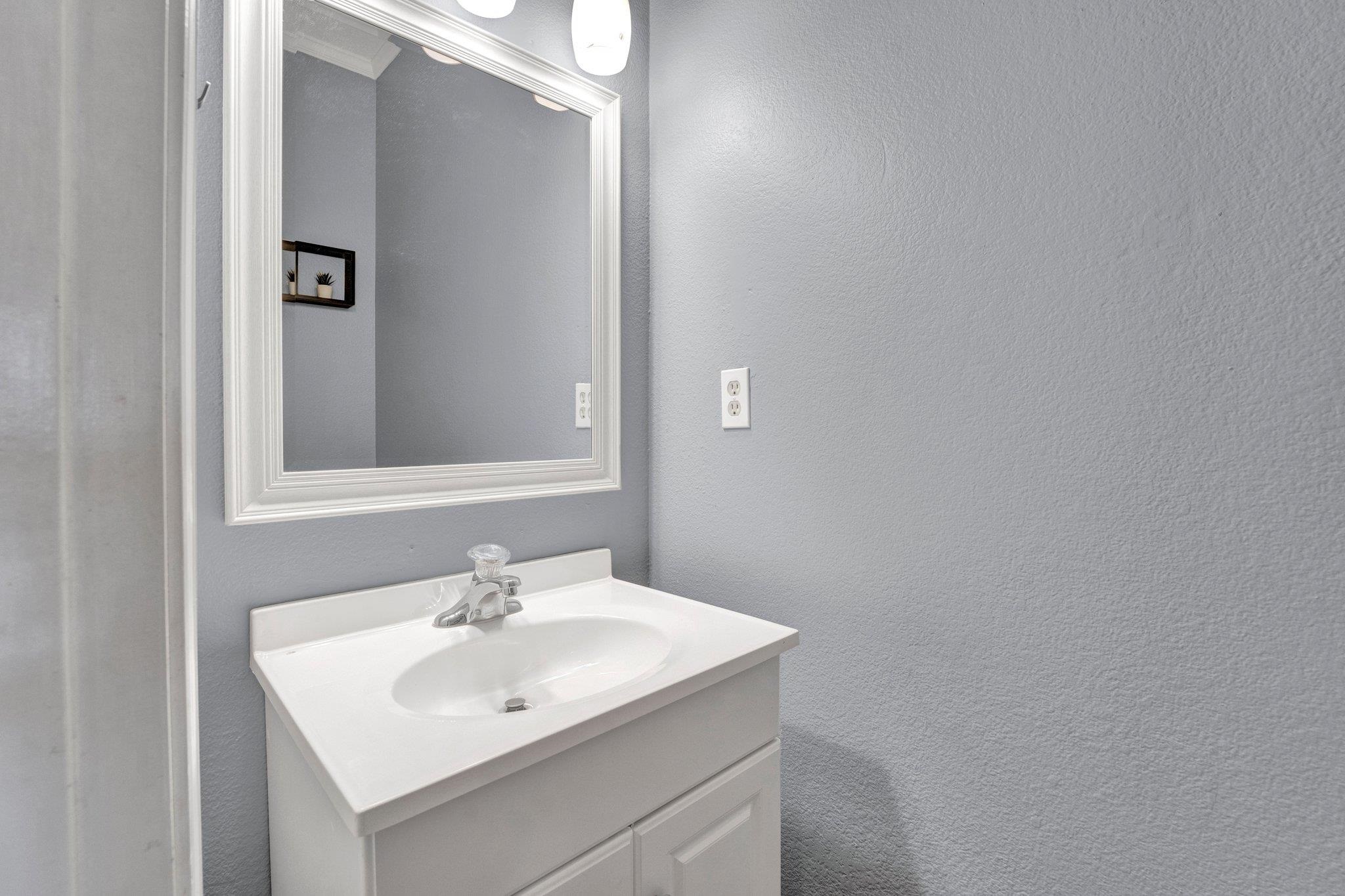 Bathroom featuring vanity