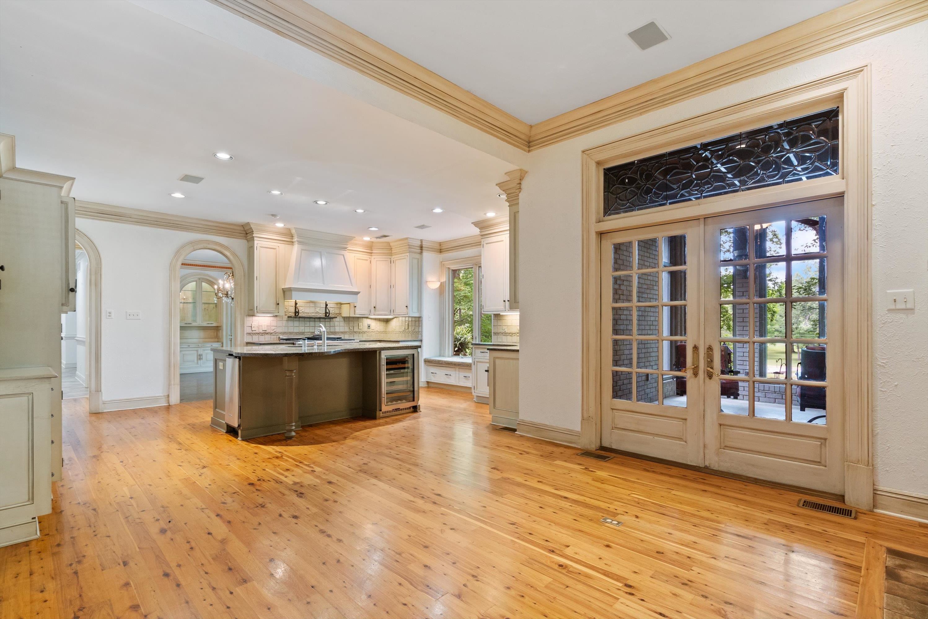 Updated with Australian Cypress Wood Floors, Double Doors to Screened Front Porch