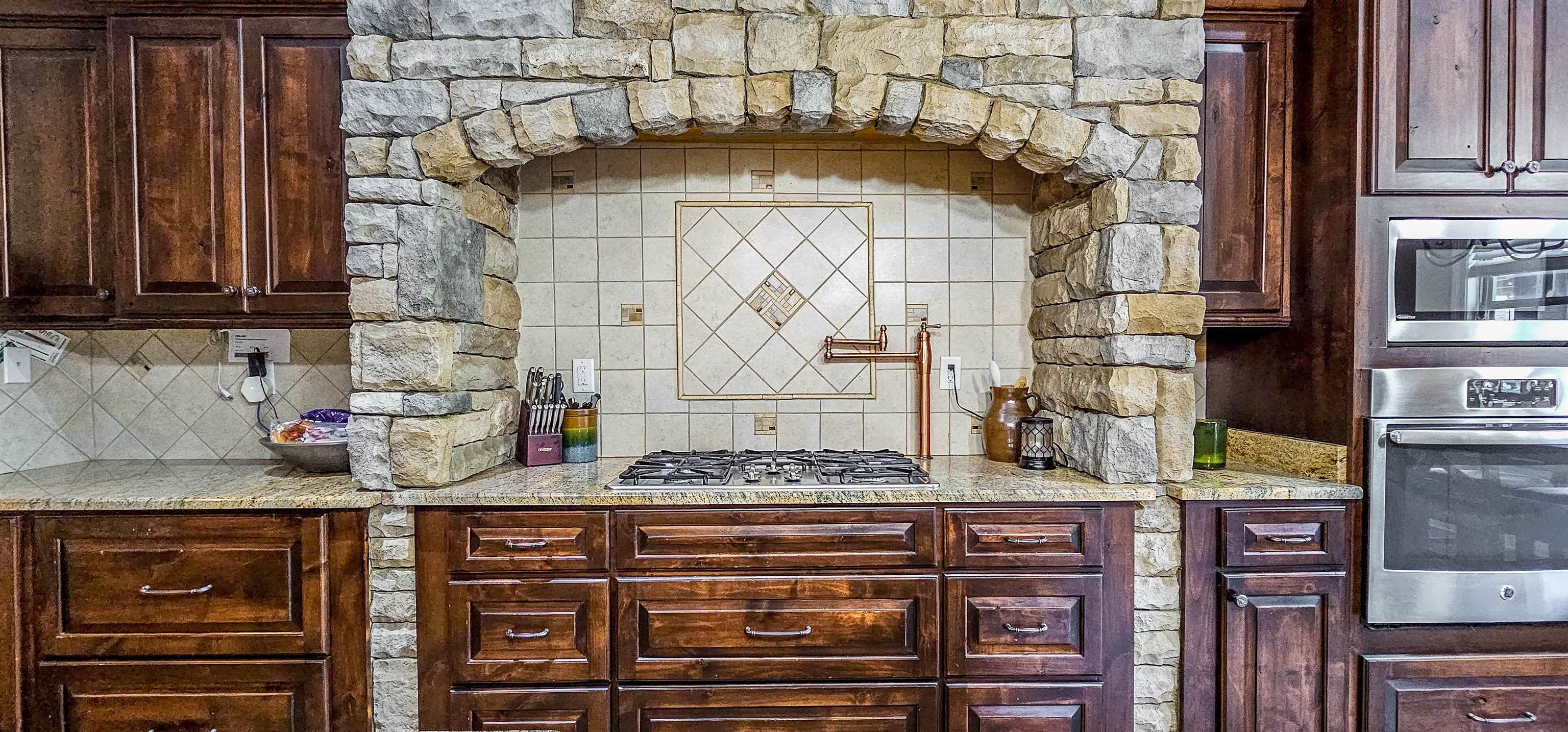 Beautiful stone archway surrounds this oven!