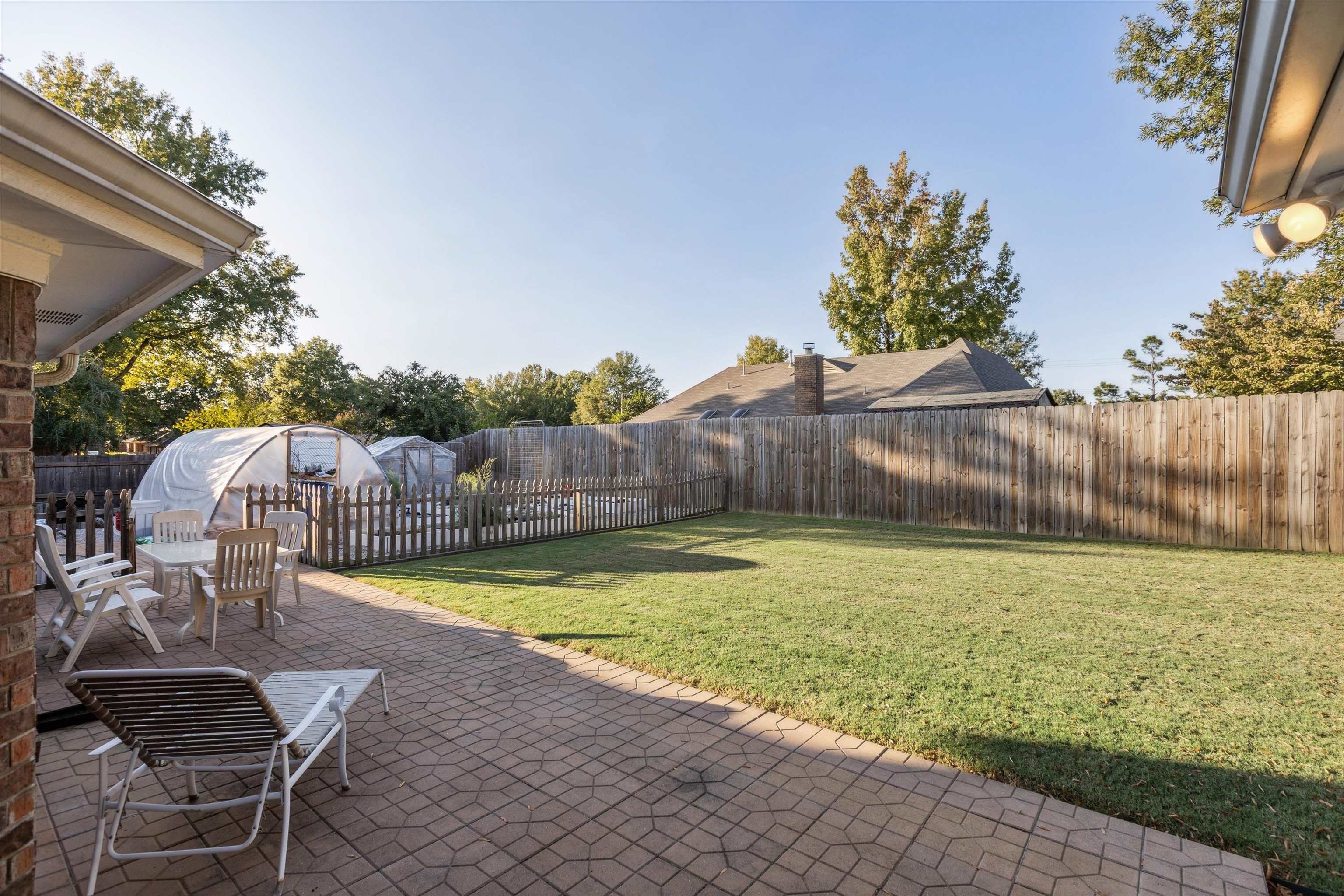 View of yard with a patio area