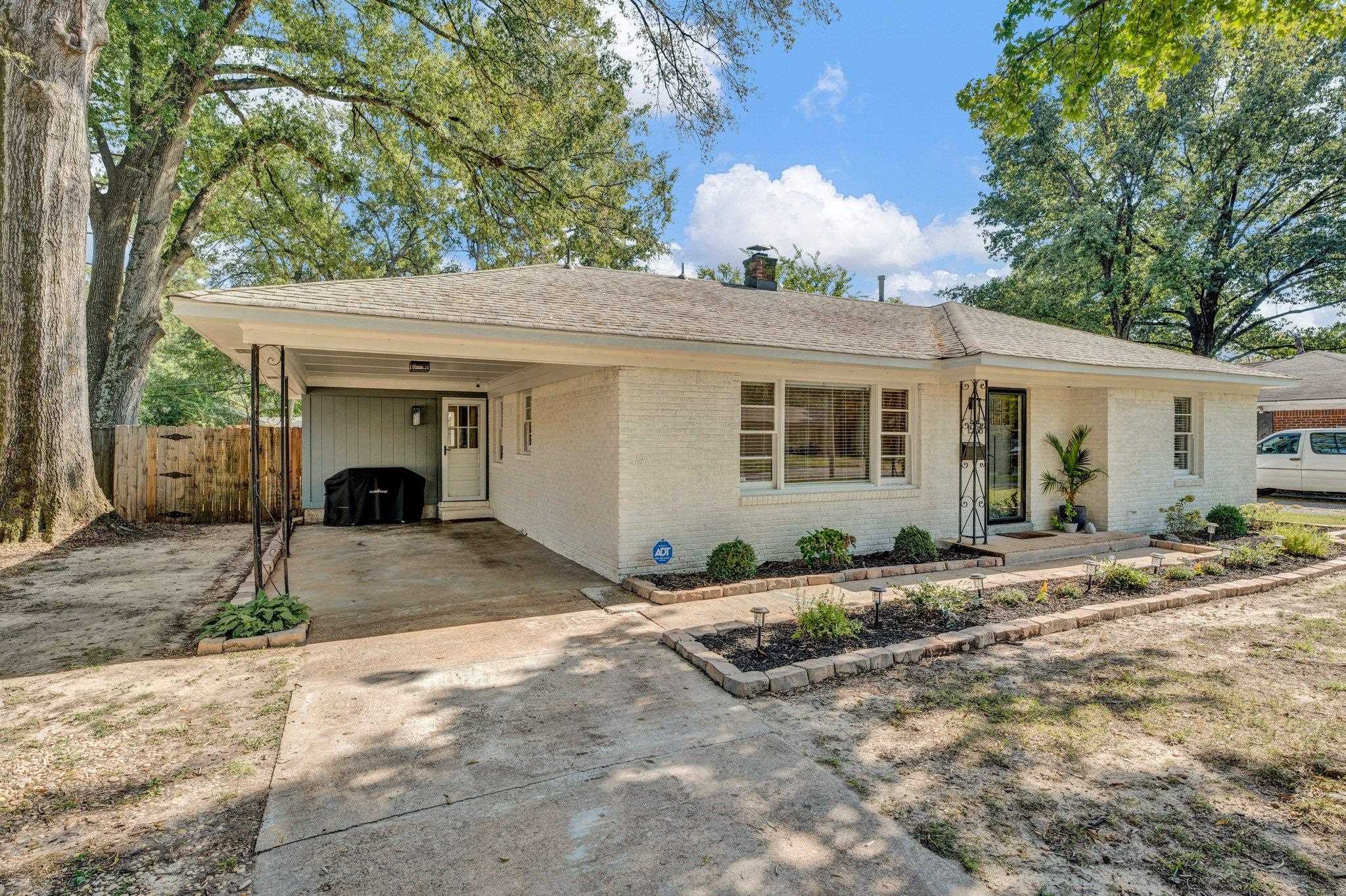 Ranch-style home with a carport