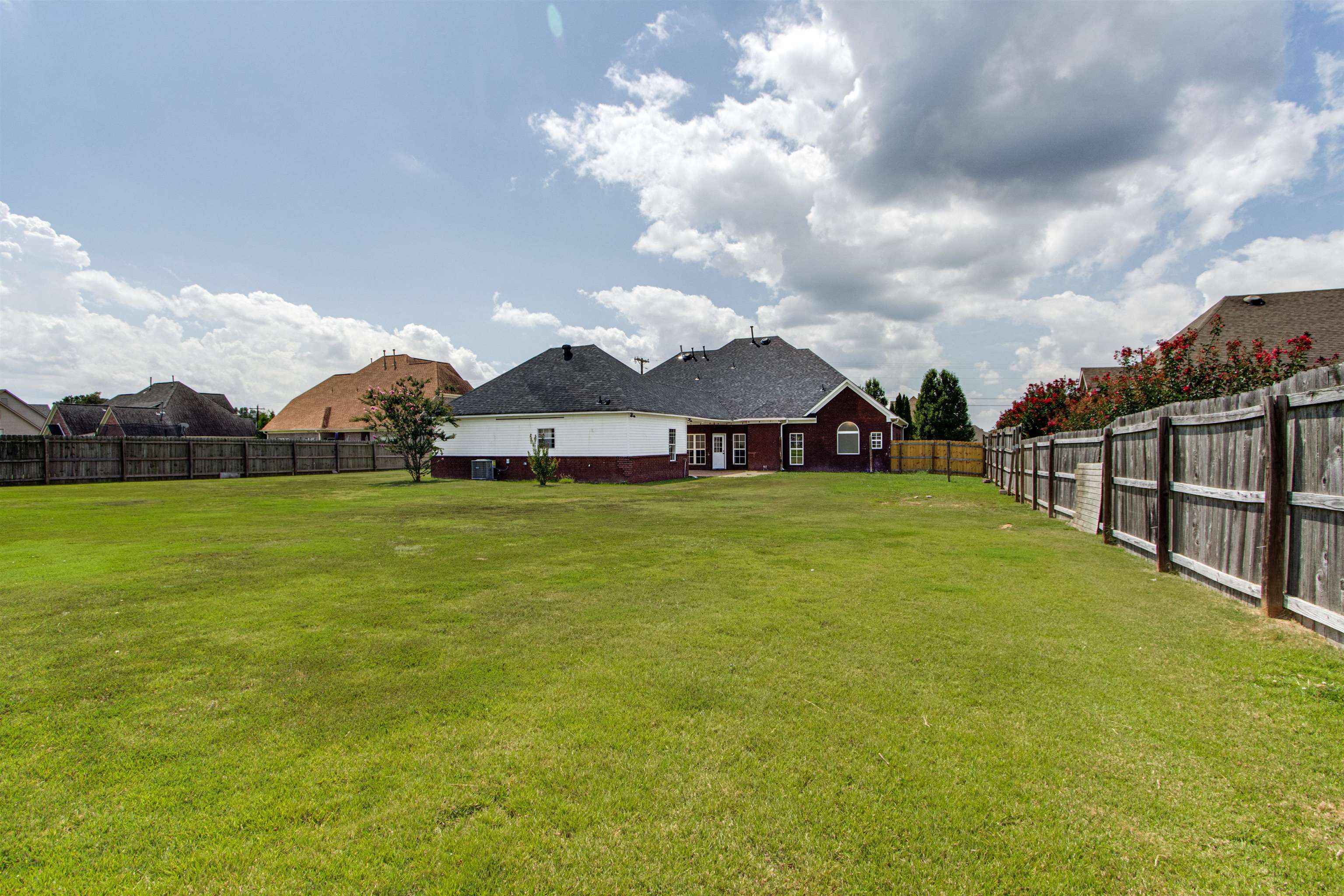 View of yard. Plenty of space to add a pool!