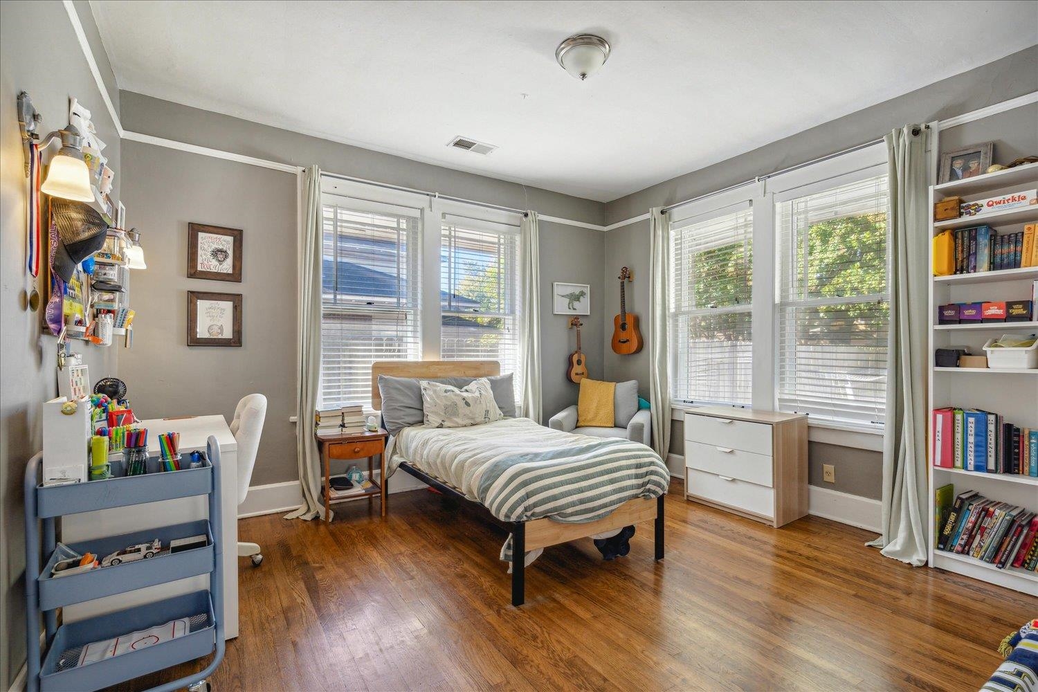 Bedroom featuring hardwood floors.
