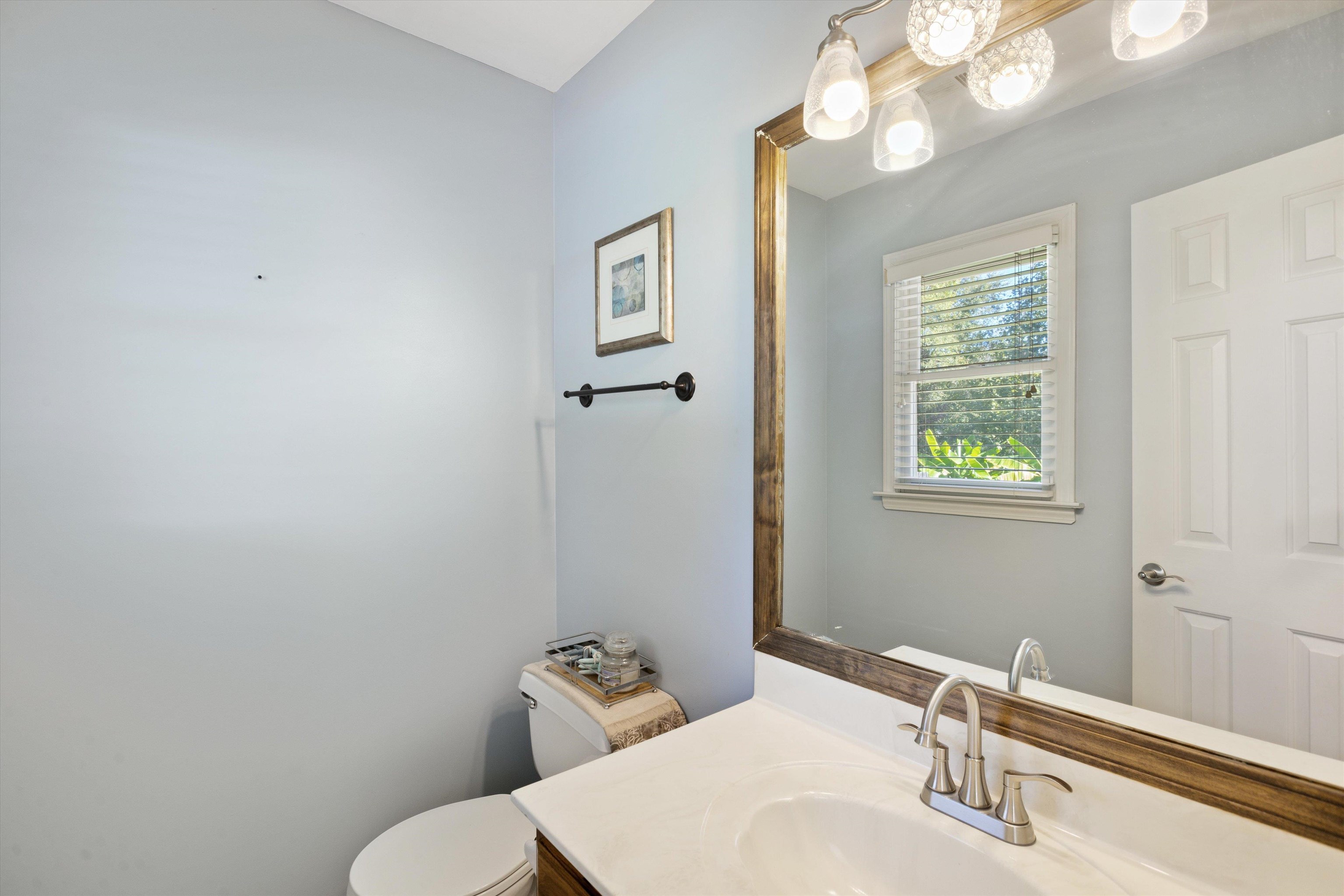 Bathroom with toilet and vanity