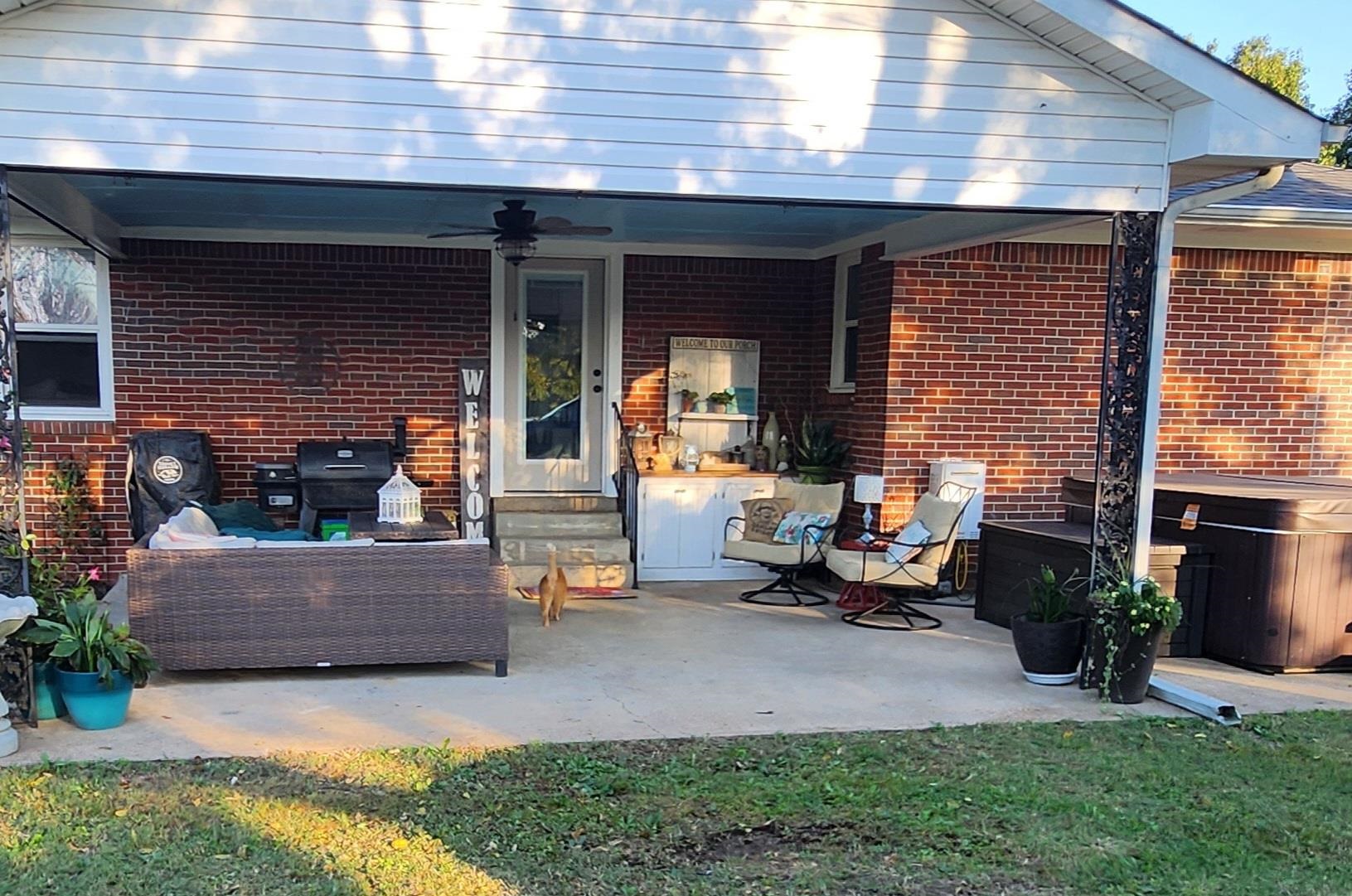 View of patio with ceiling fan