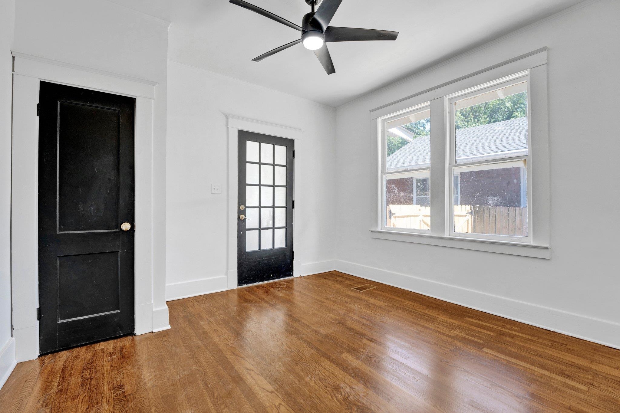 Entryway featuring hardwood / wood-style flooring and ceiling fan