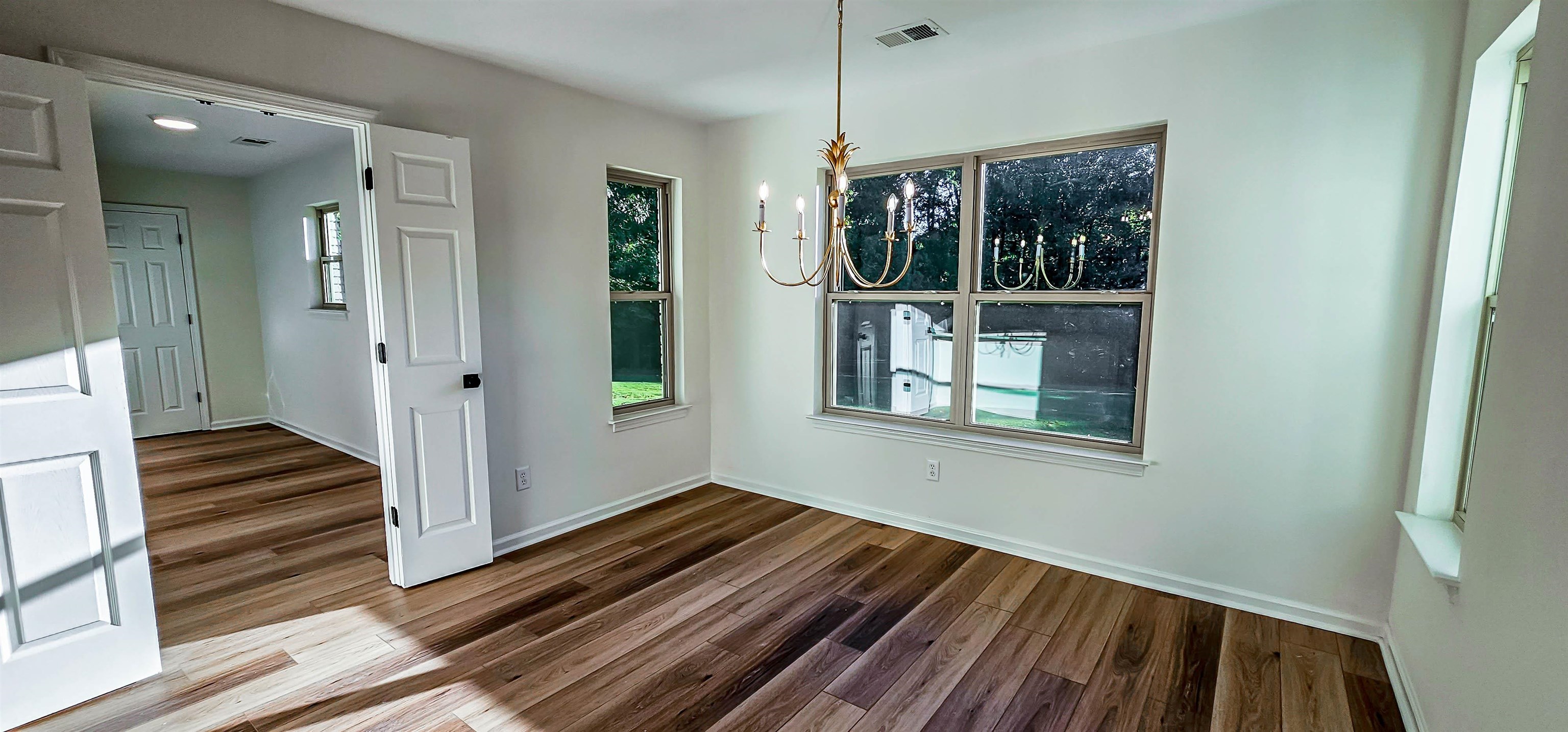 DOUBLE DOORS TO LAUNDRY ROOM AND GARAGE