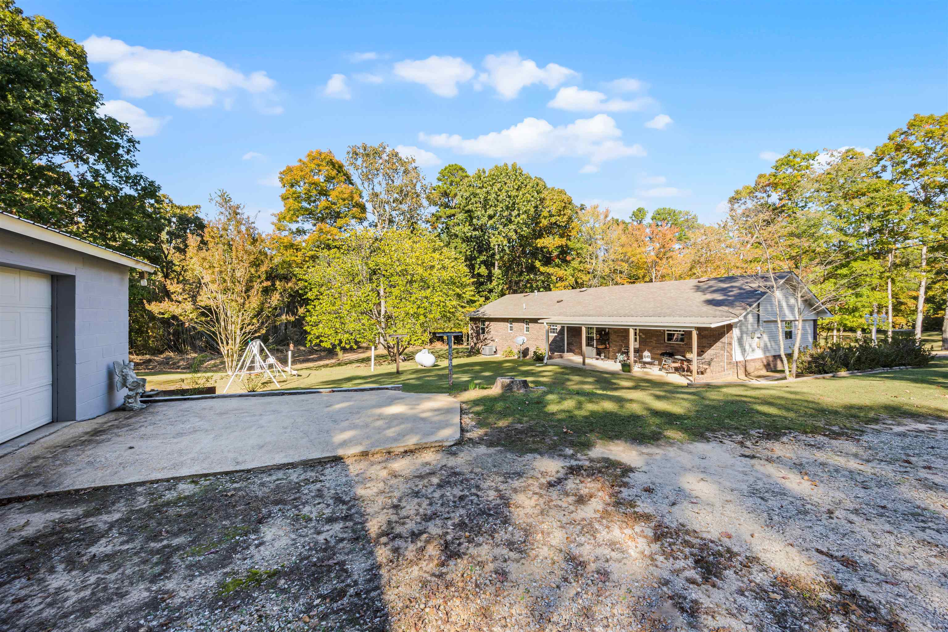 View of yard featuring a garage