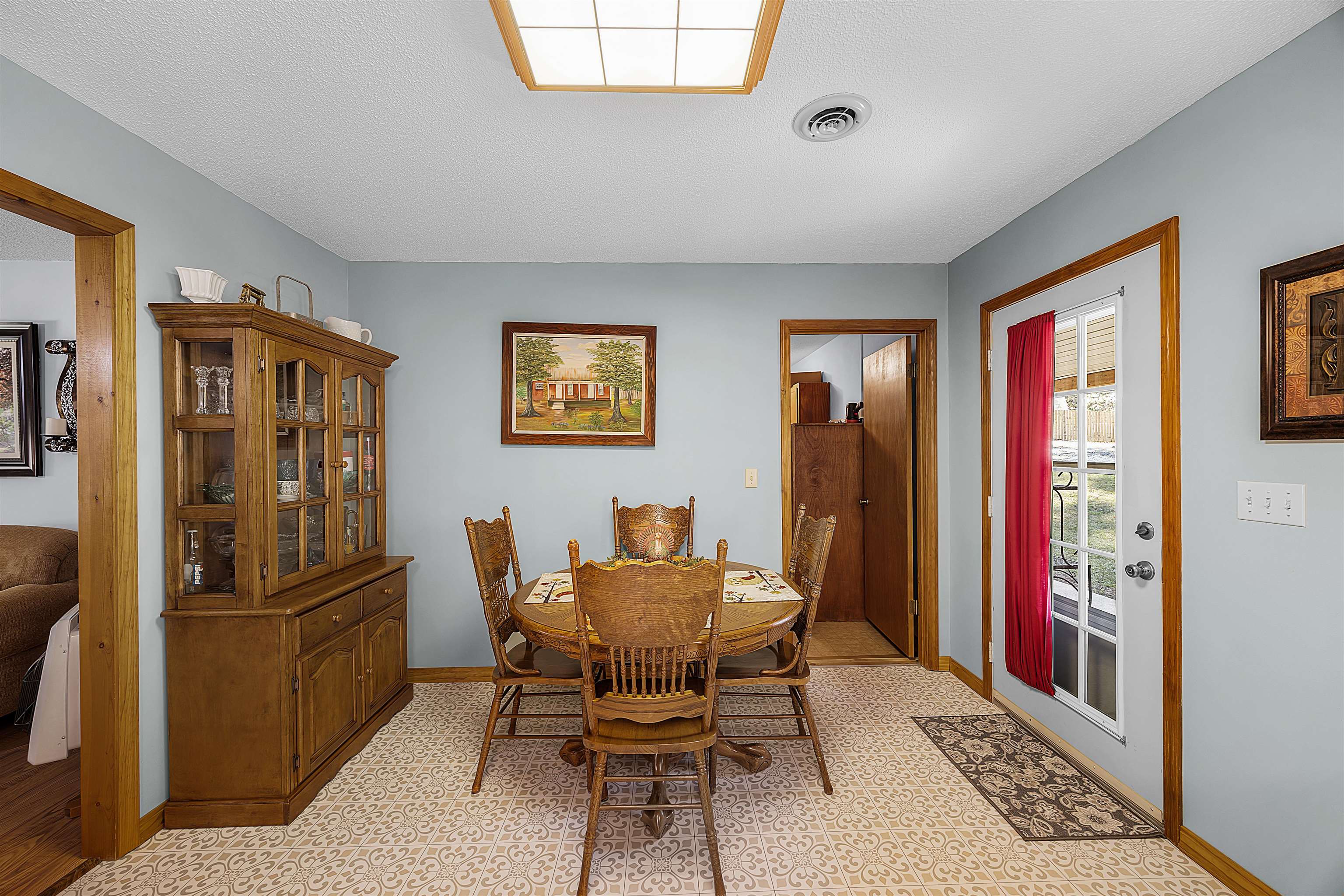 Dining space featuring a textured ceiling