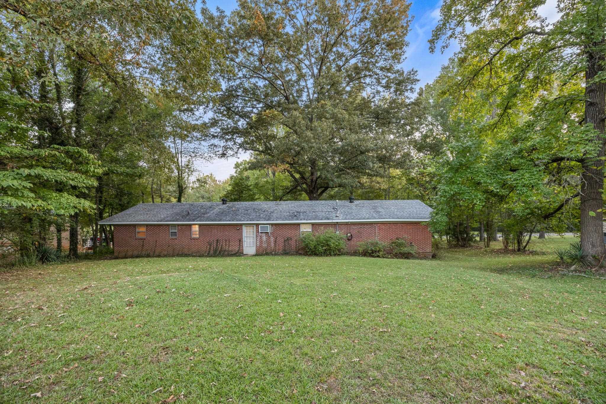 Exterior space with a lawn