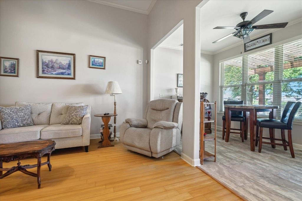 Lots of natural light in the den from the Sunroom!
