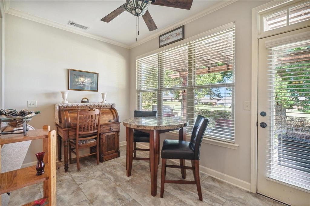 Lots of natural light in the sunroom. Could also be used as a dining room, office, or sitting room.