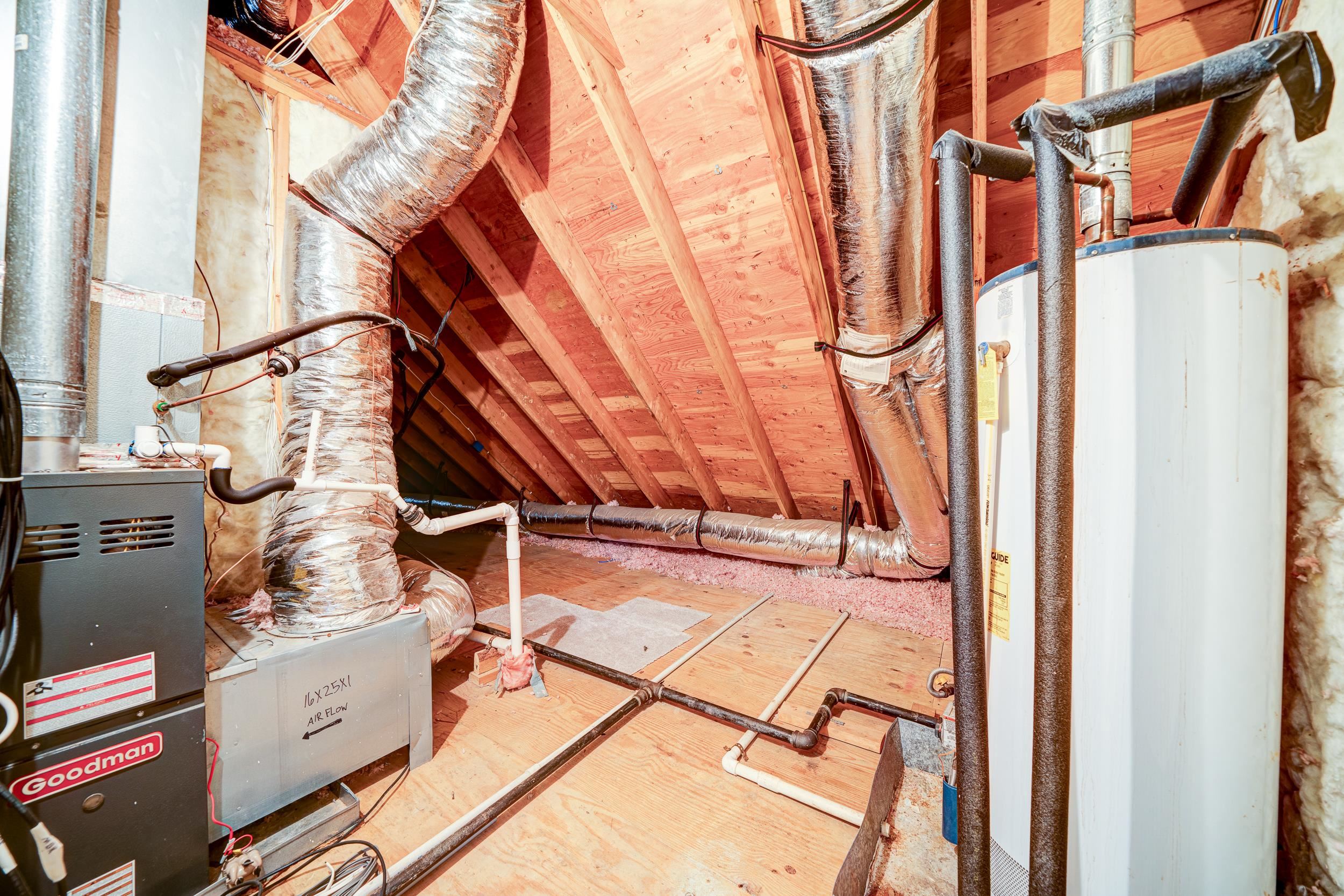 Unfinished attic with water heater