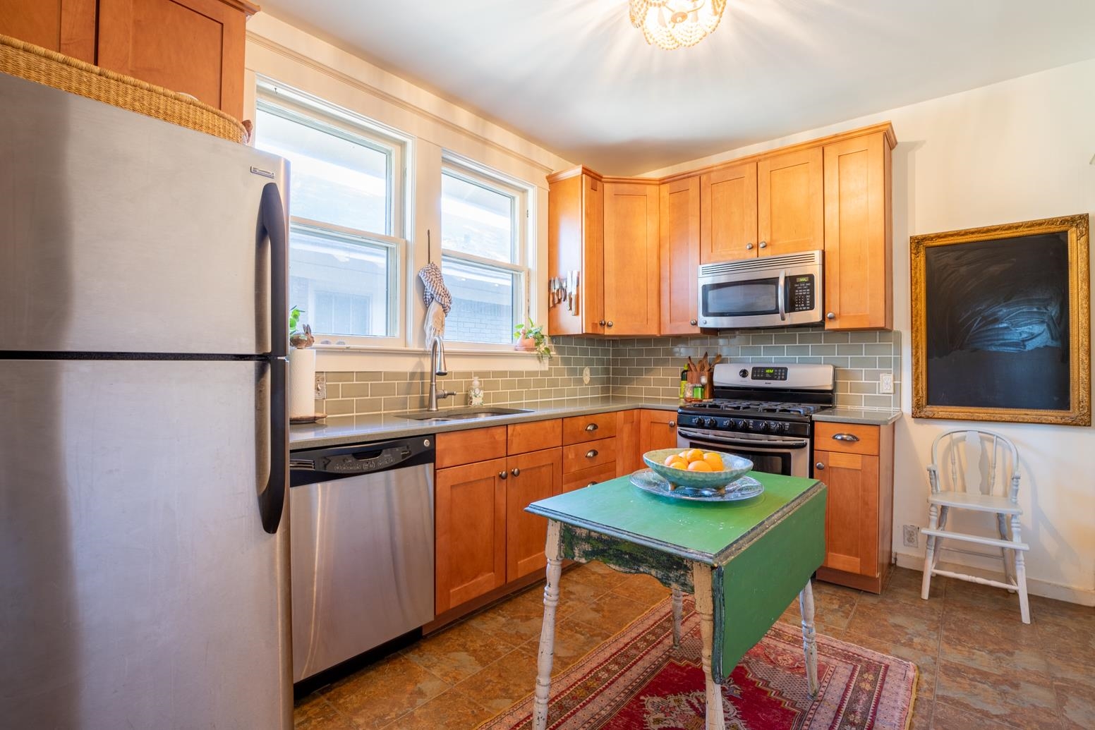 Solid surface countertops, room for an island, gas cooking