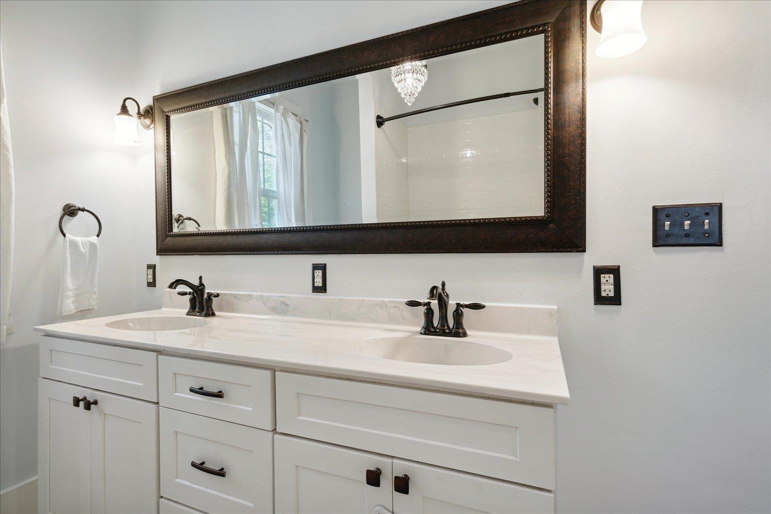 Bathroom featuring vanity and a shower with curtain