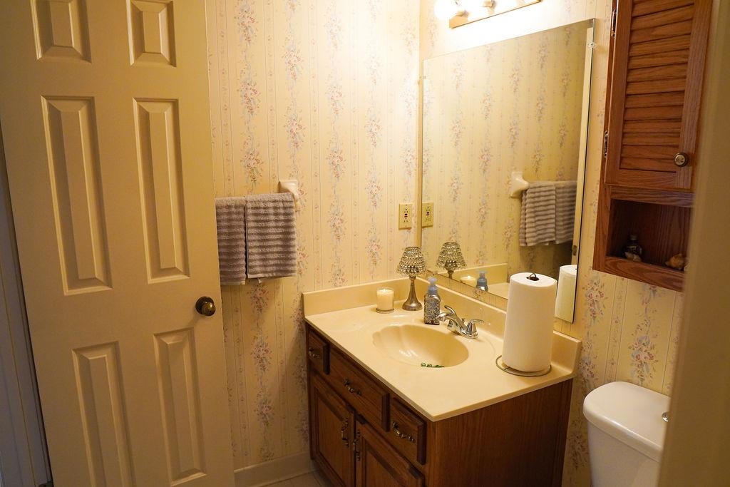 Bathroom with vanity and toilet