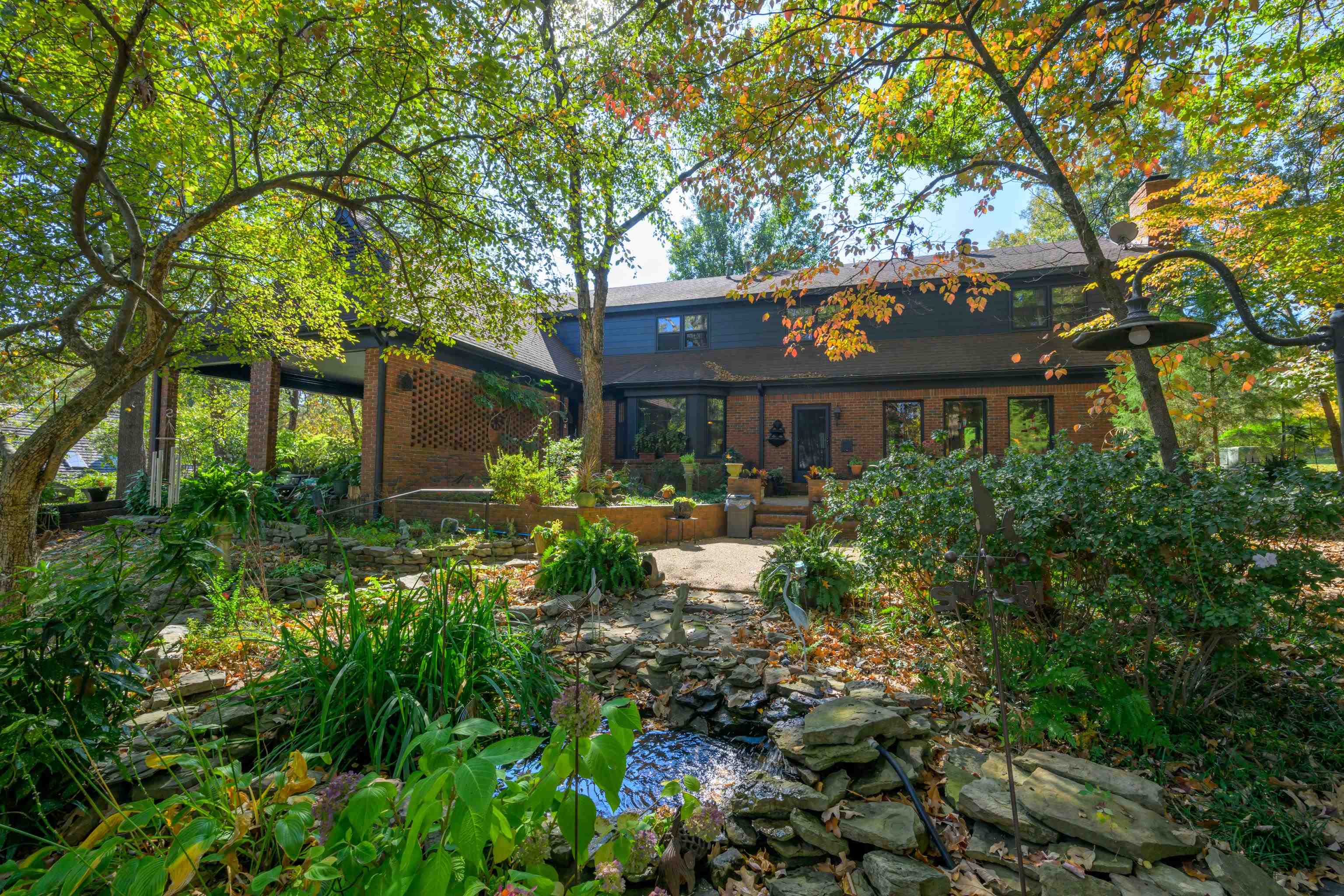 Rear view of house featuring a patio area