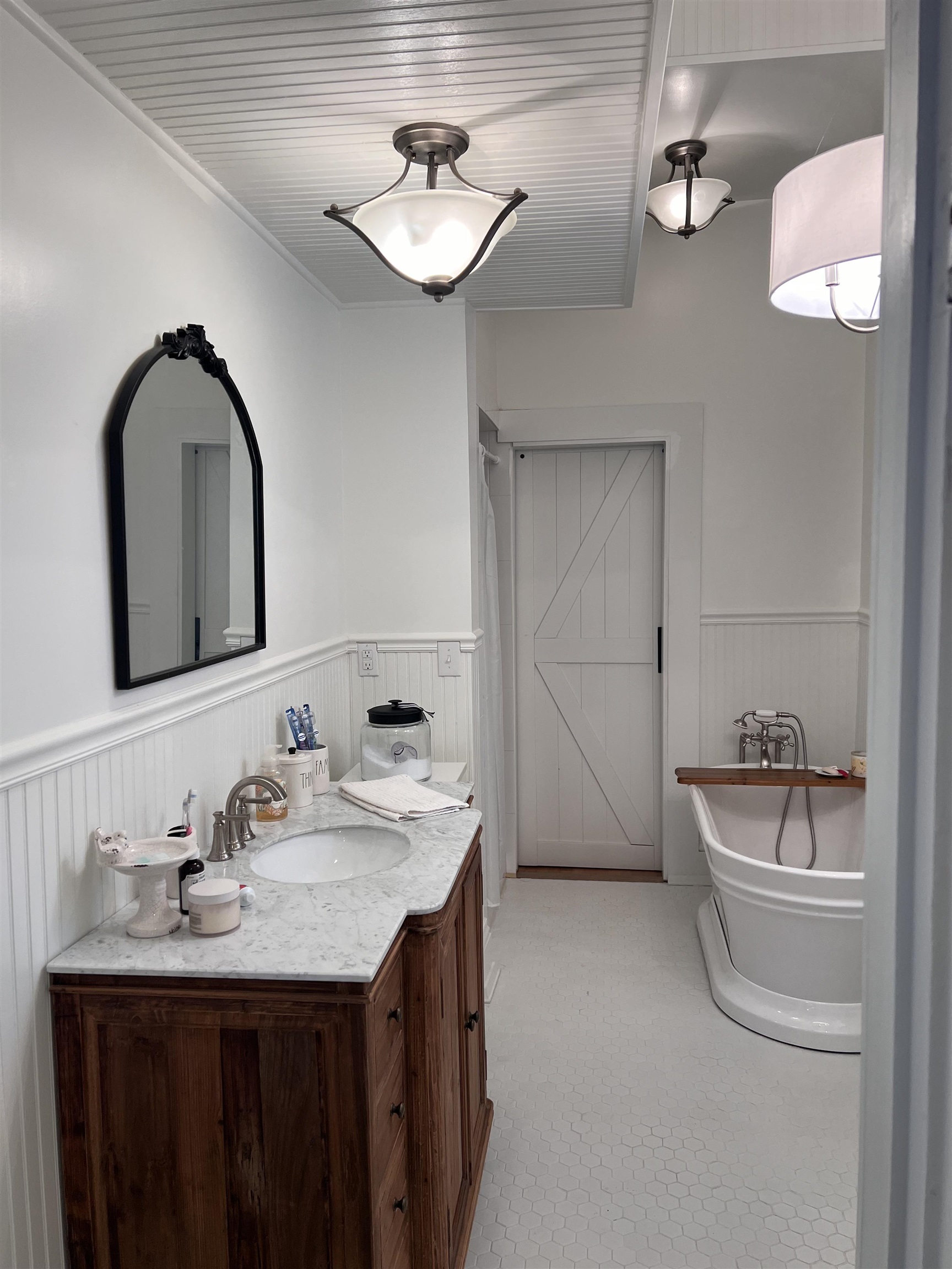 Bathroom featuring vanity and a bathing tub