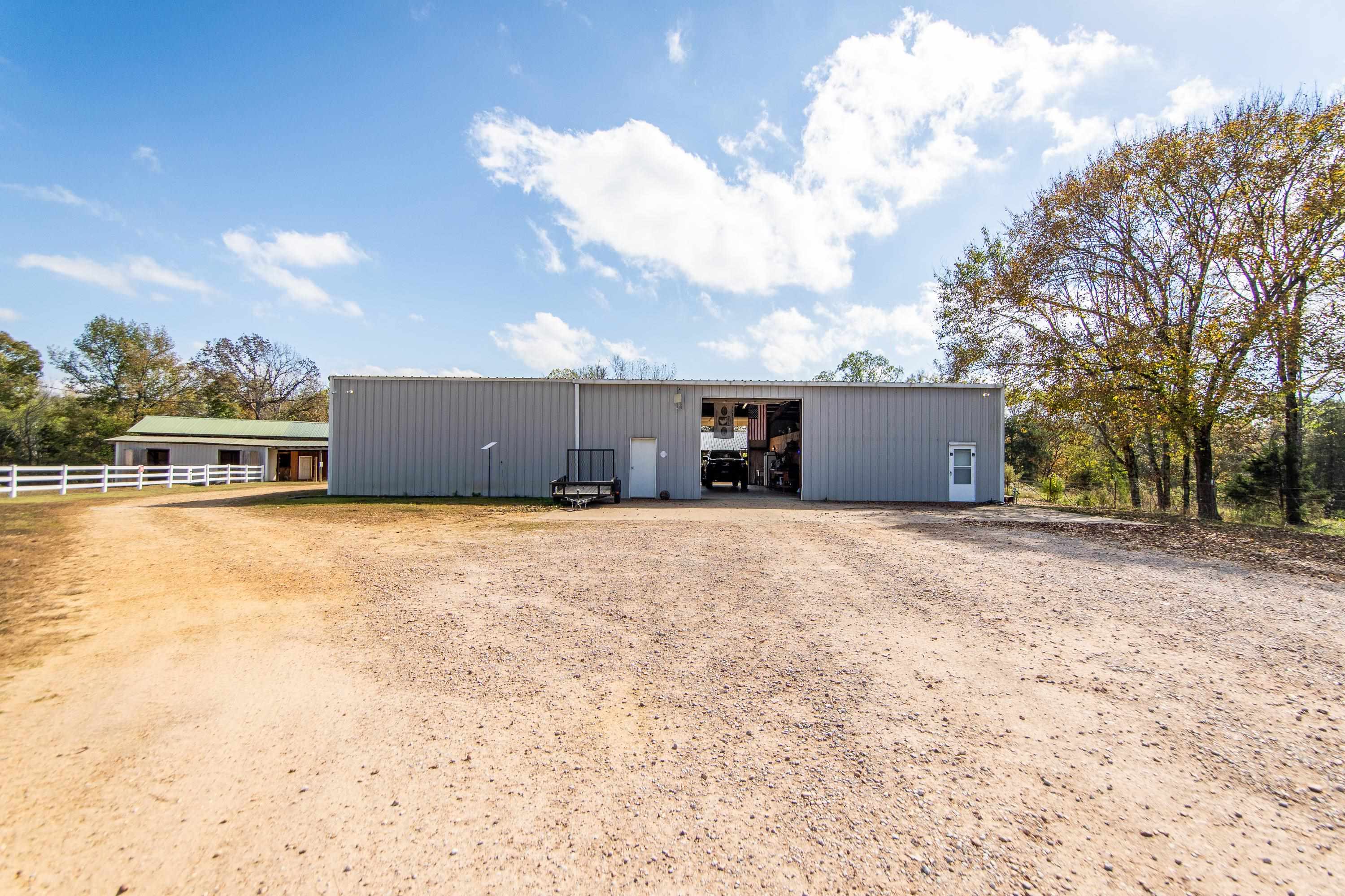 View of front facade with an outbuilding