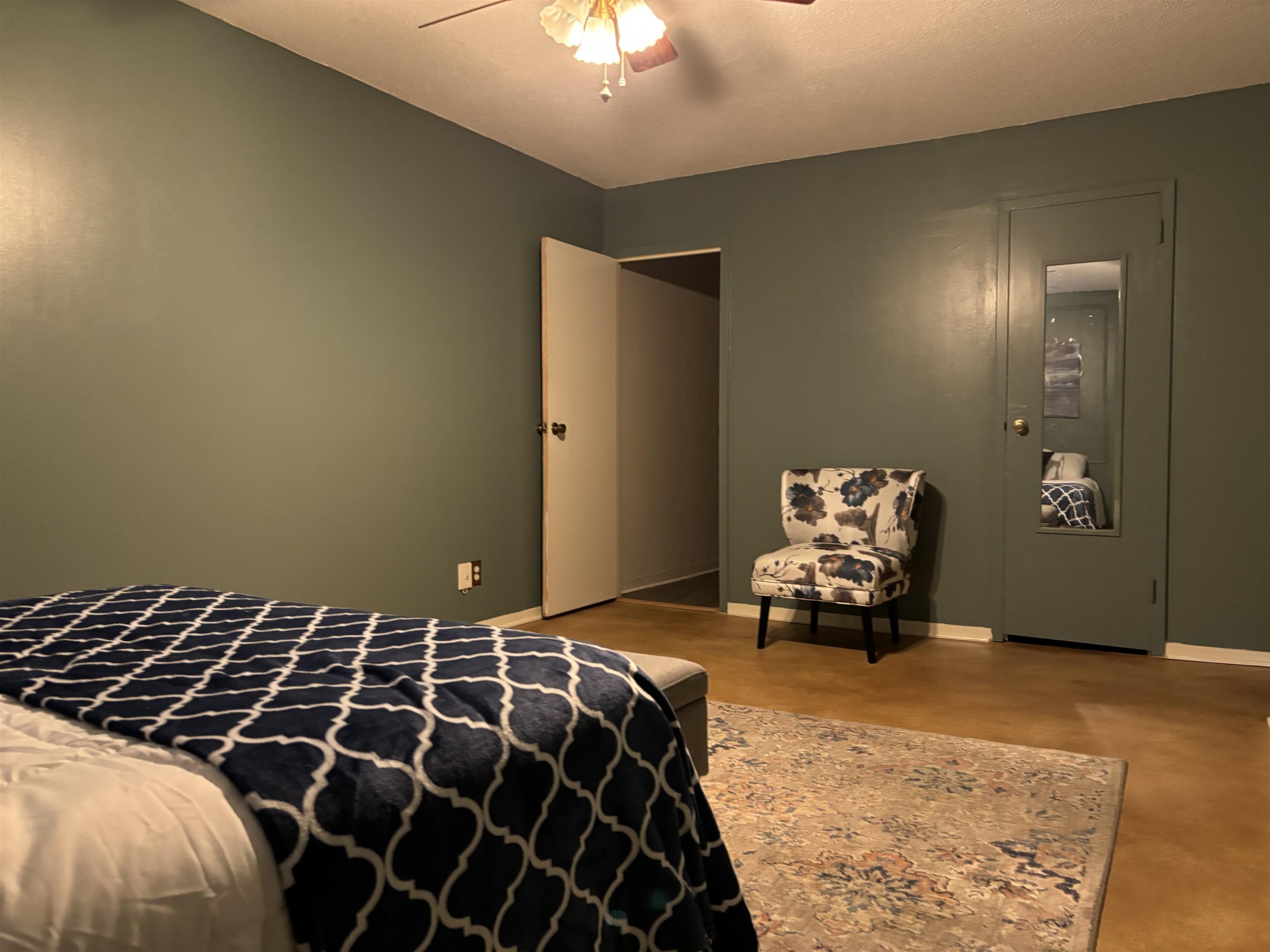 Bedroom featuring ceiling fan