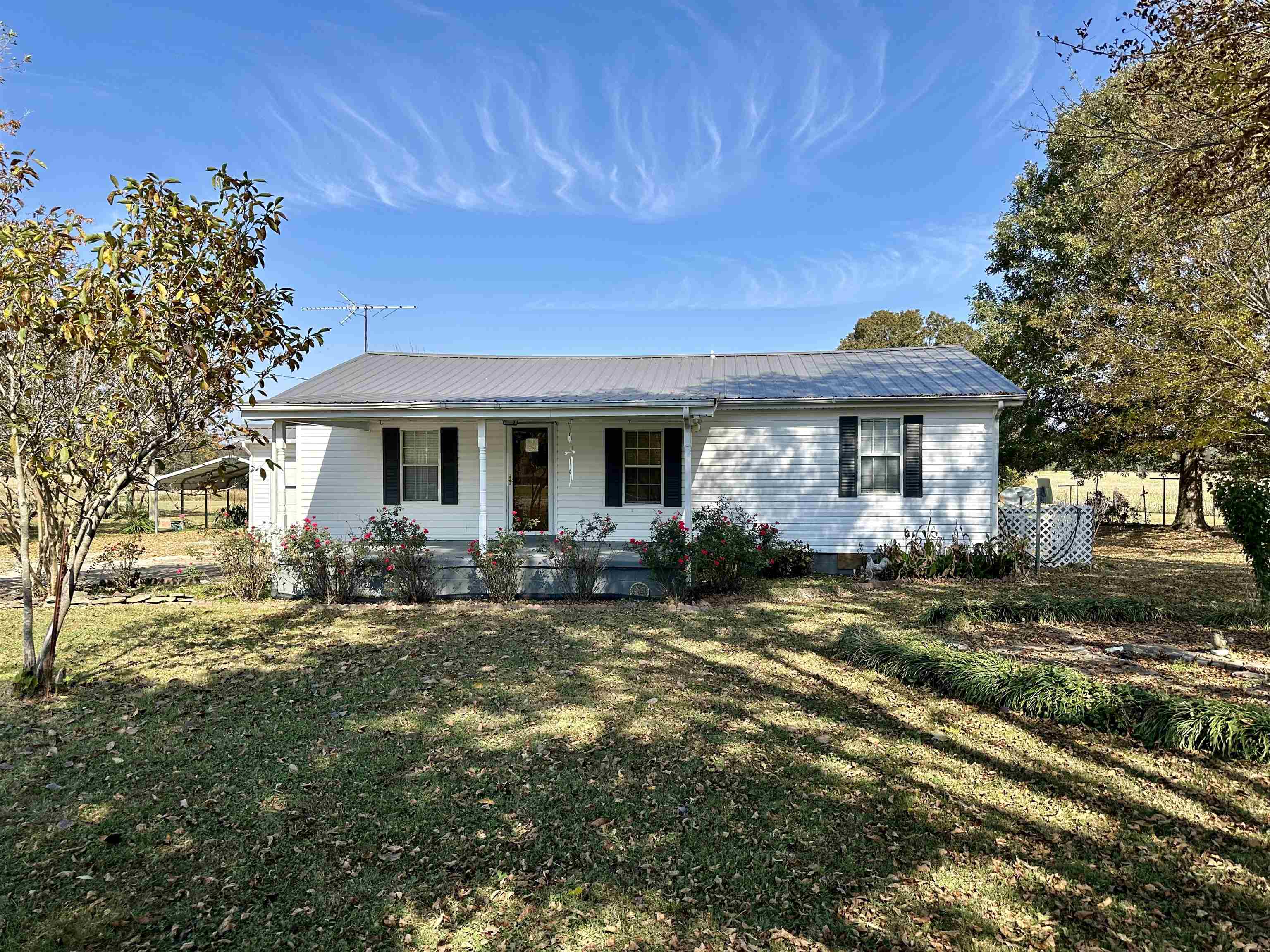 View of front of home featuring a front lawn