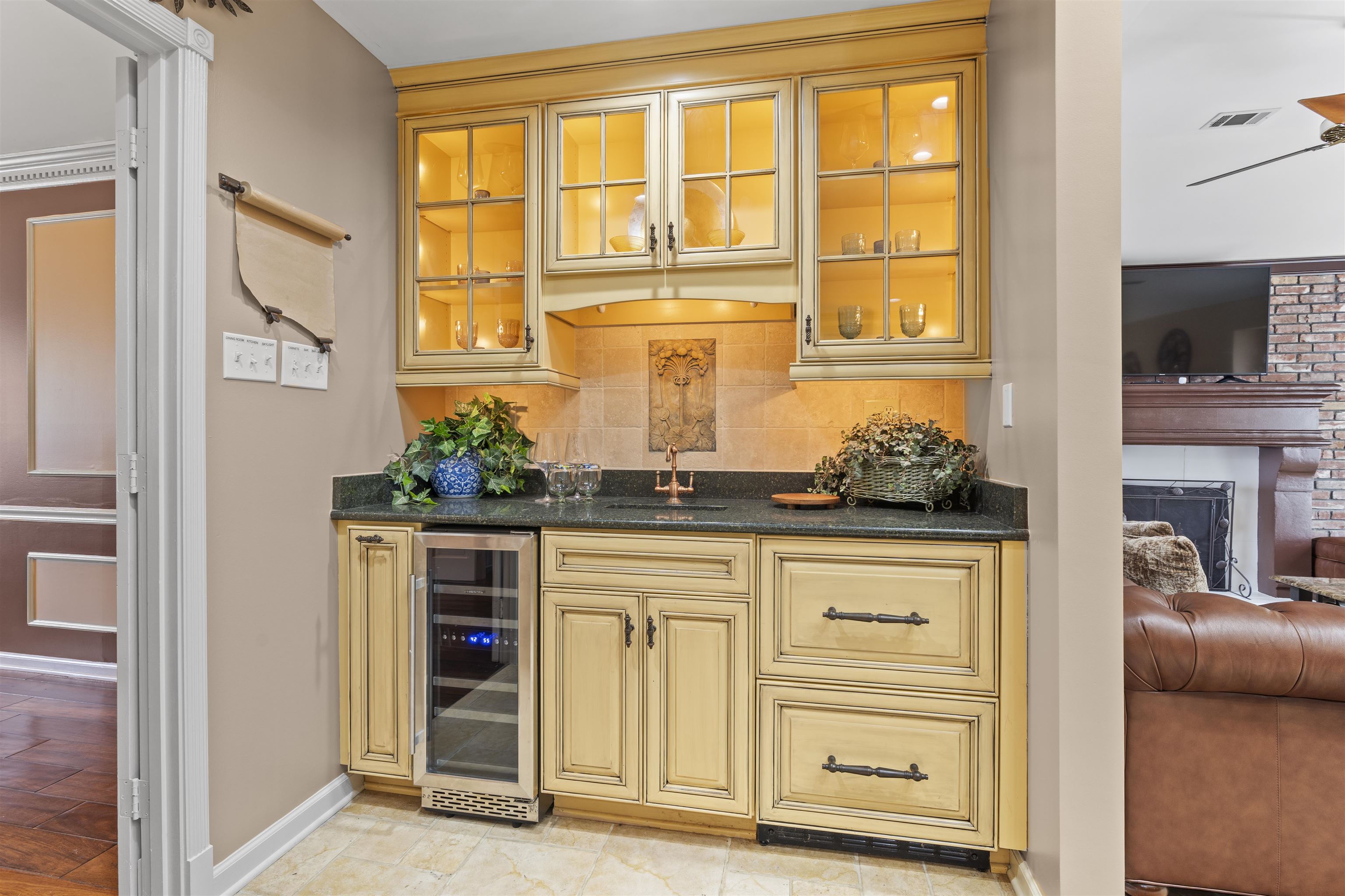 Wet bar/coffee bar with sink, wine cooler, and refrigerated drawers.