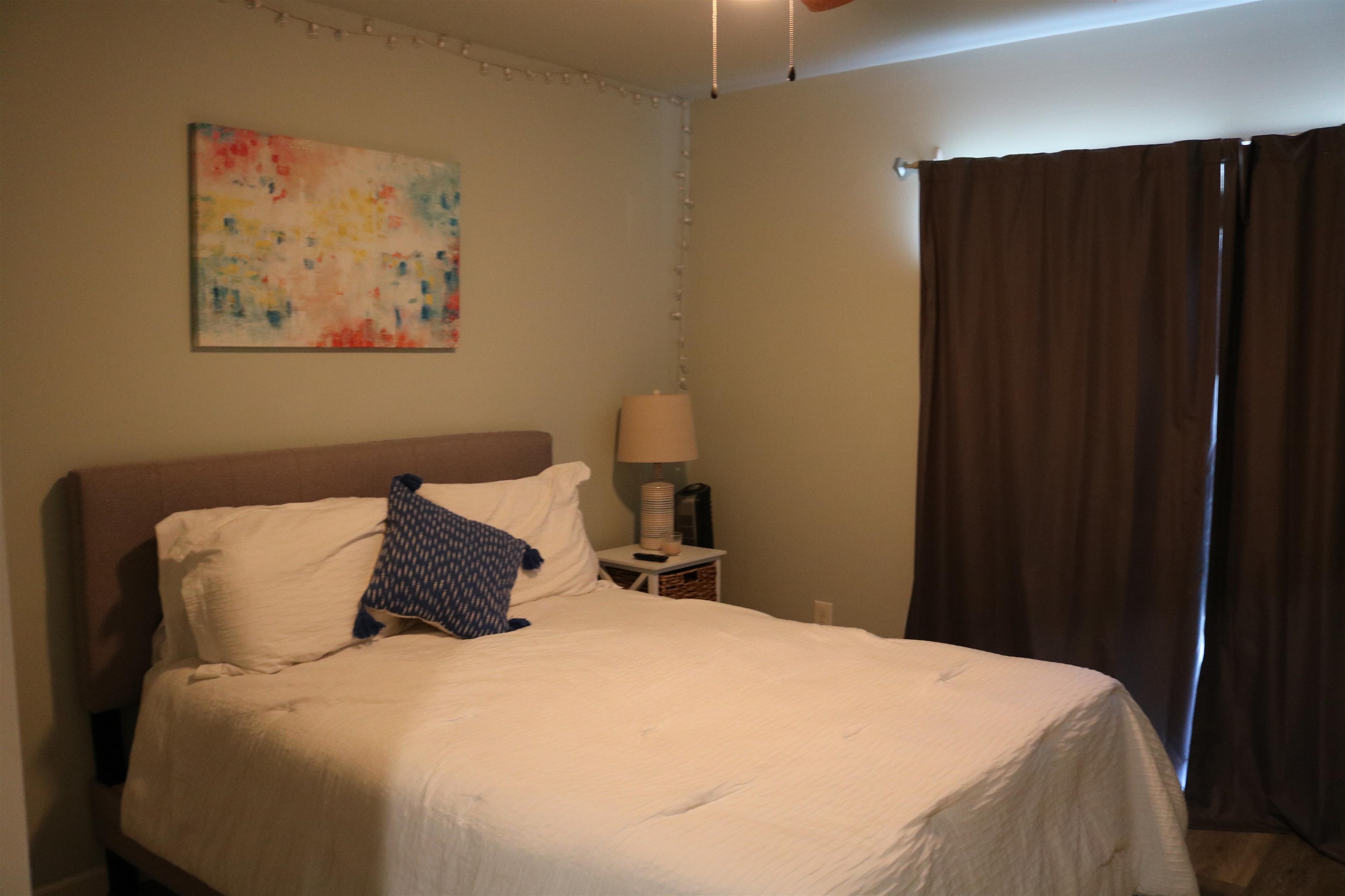 Bedroom with wood-type flooring