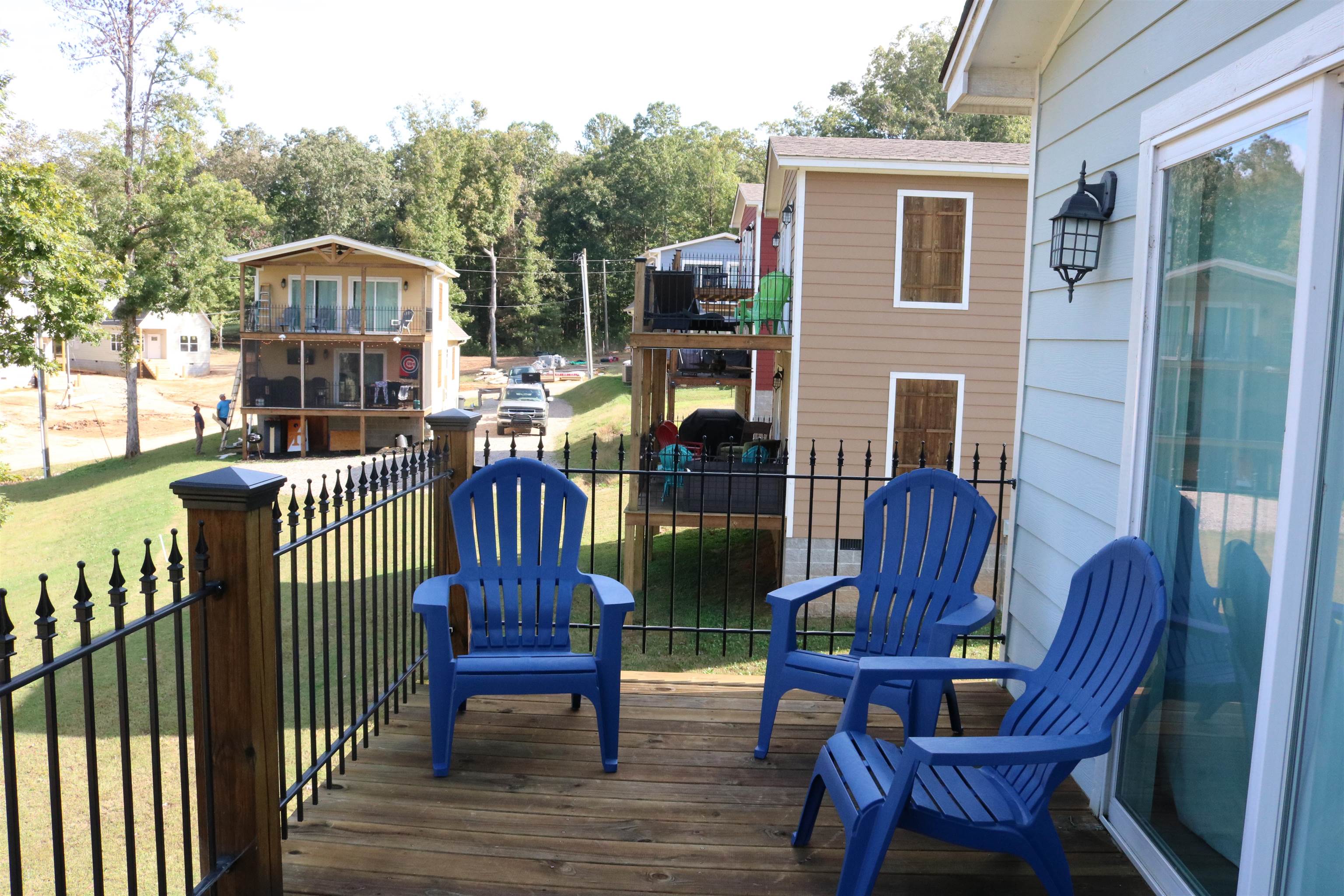 Wooden deck featuring a lawn